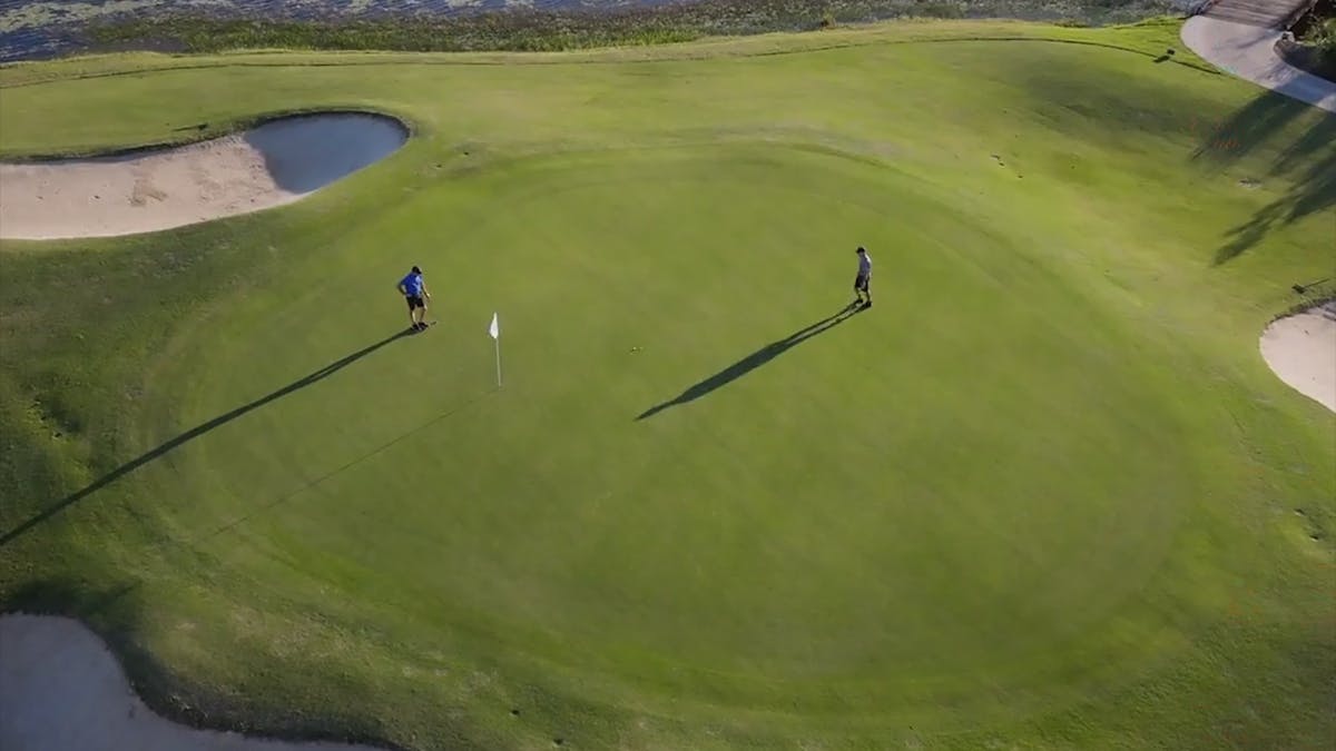 Drone image of the green at pelican waters golf club