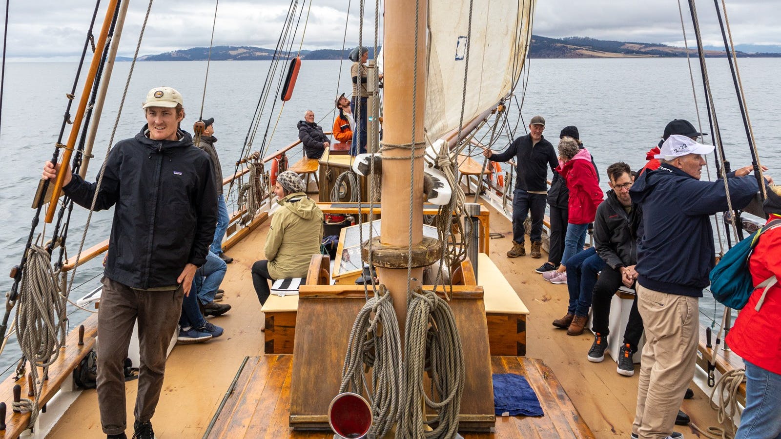 Pasengers enjoying time on deck .