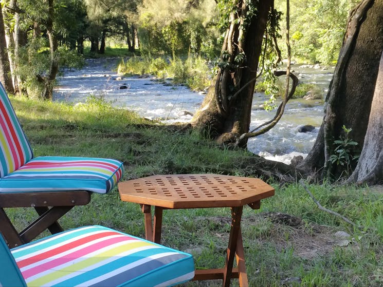chairs beside river