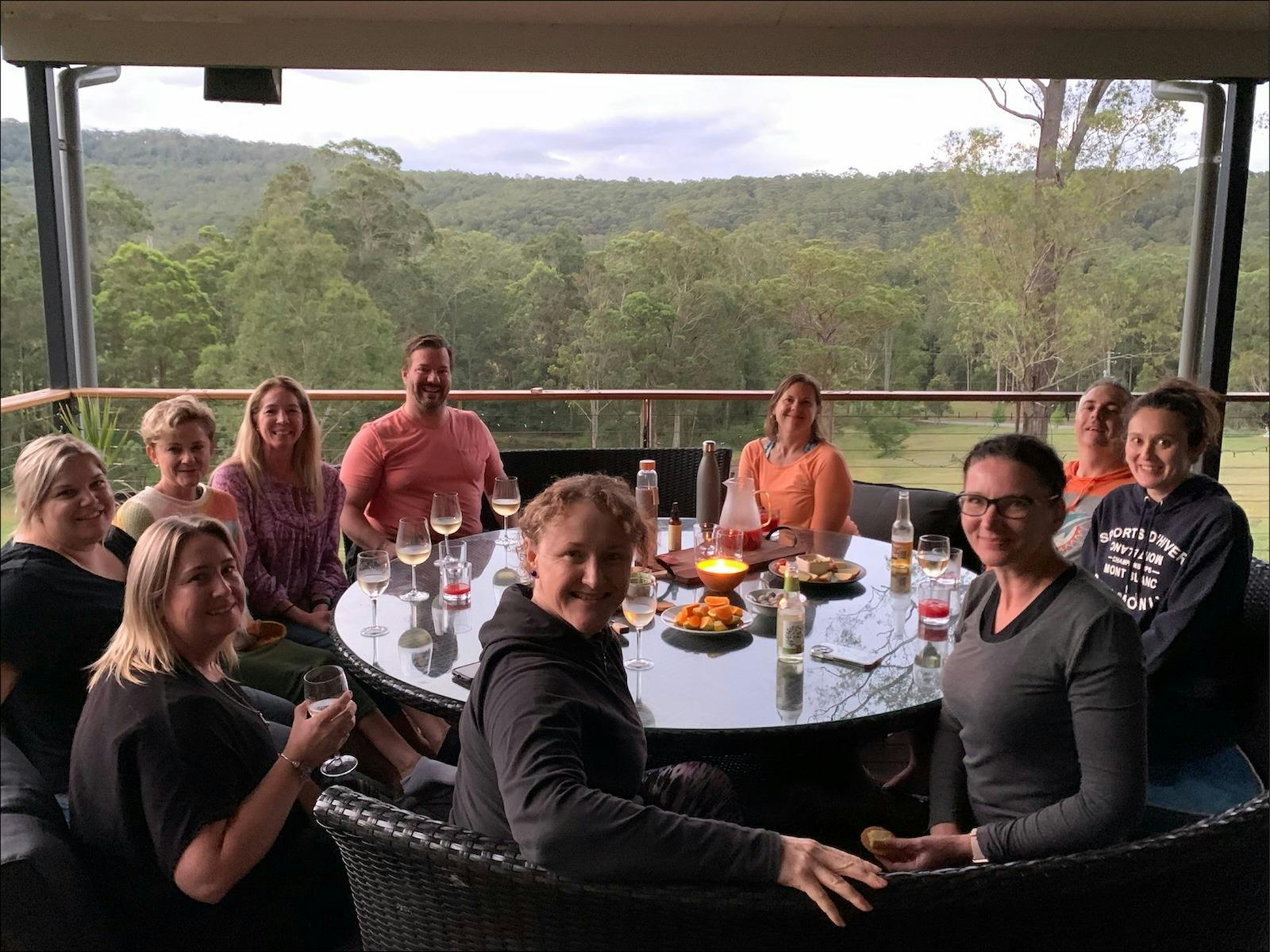 Group having lunch together at a fitness retreat