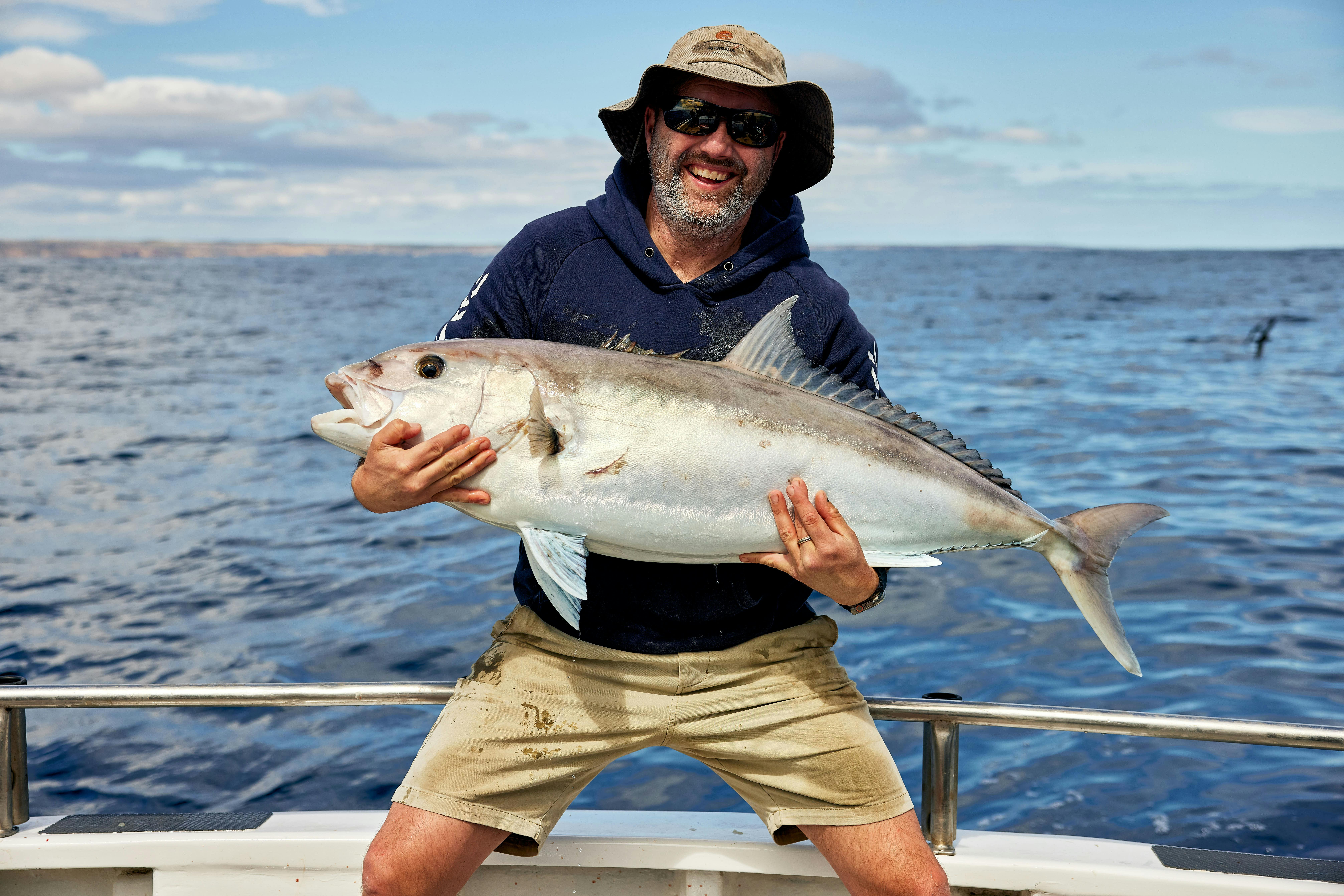 Fisherman onboard Reef Encounters with Samson Fish