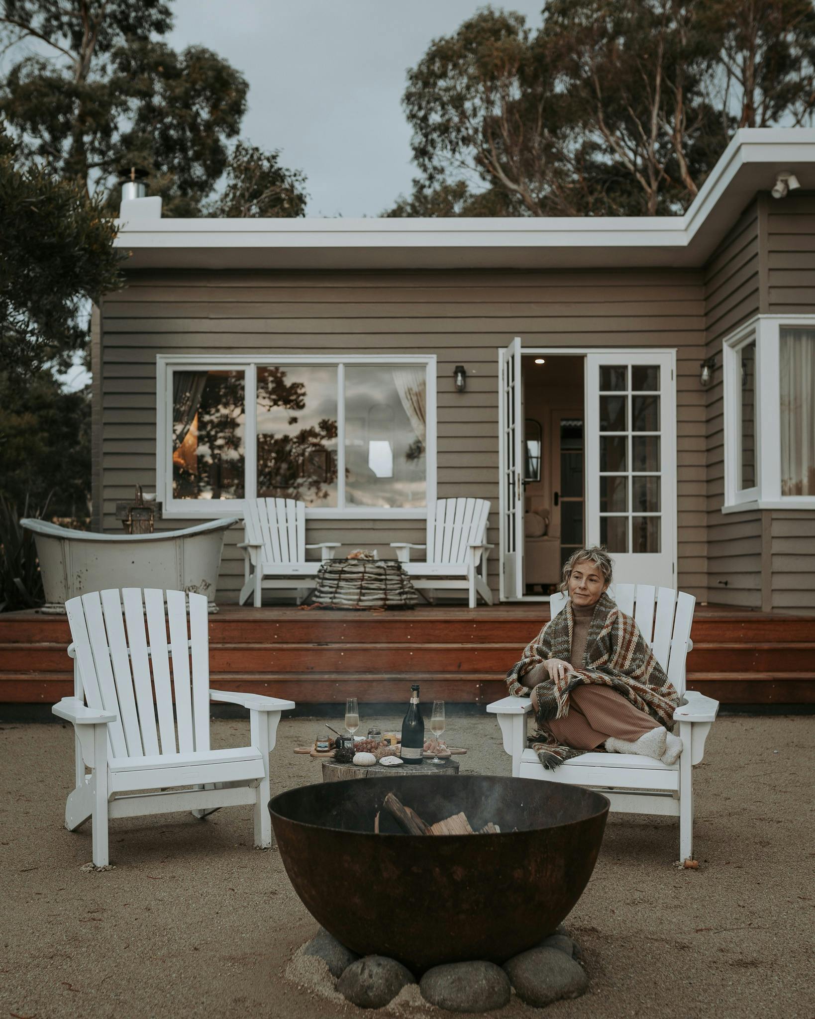 Unwind by the fire pit as the sun dips over the D’Entrecasteaux Channel