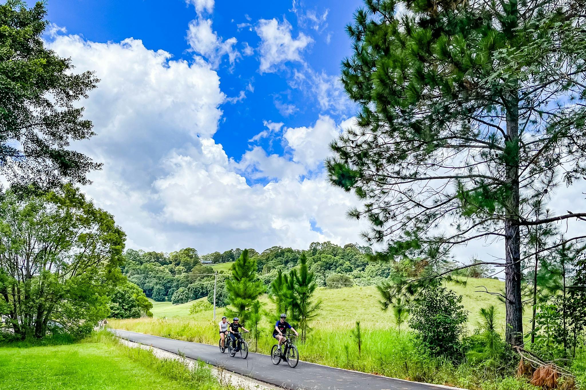Group of E Bike riders on the rail trail at Stokers Siding in open countryside