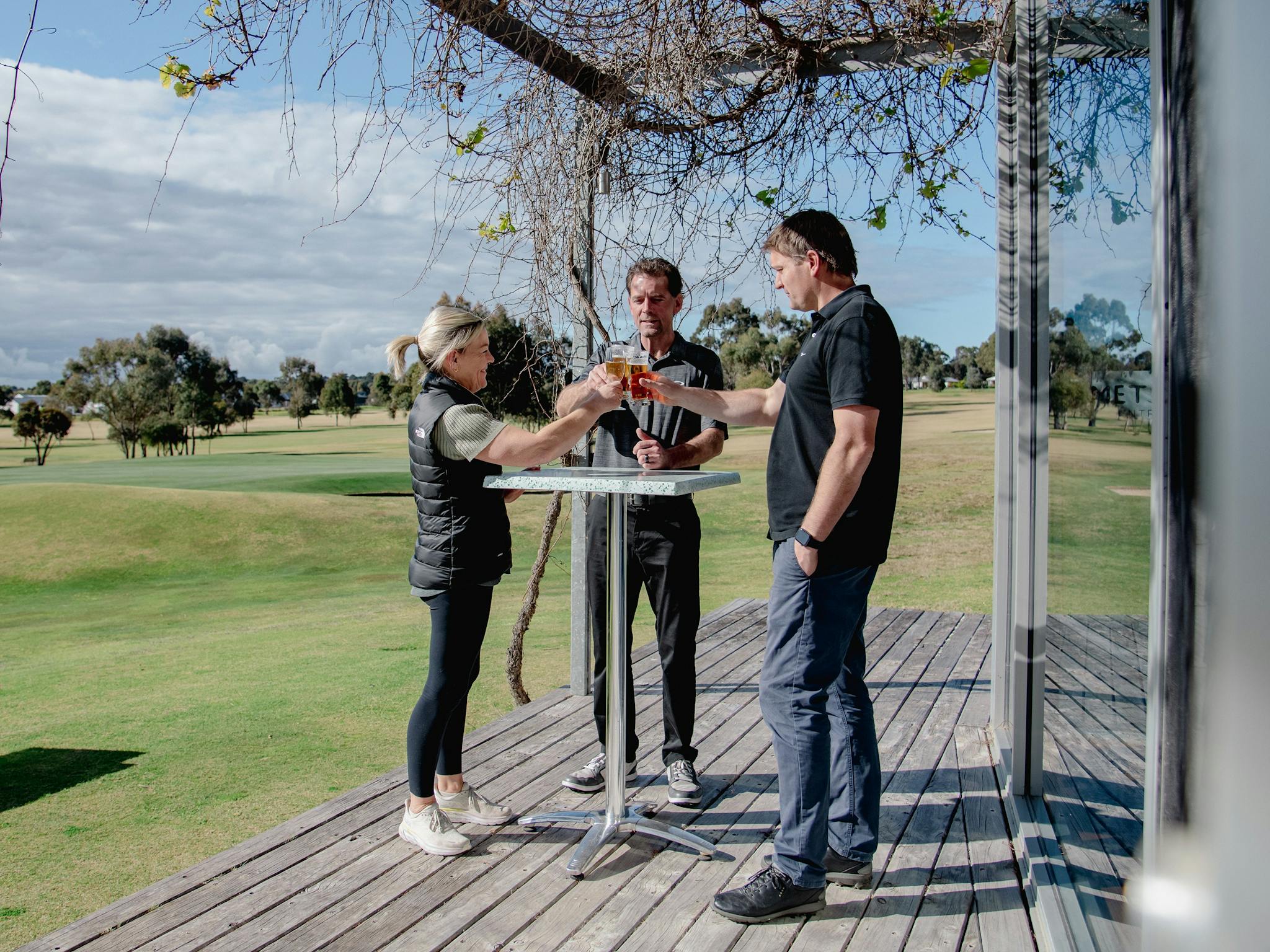 Friends enjoying drinks at Metung Country Club