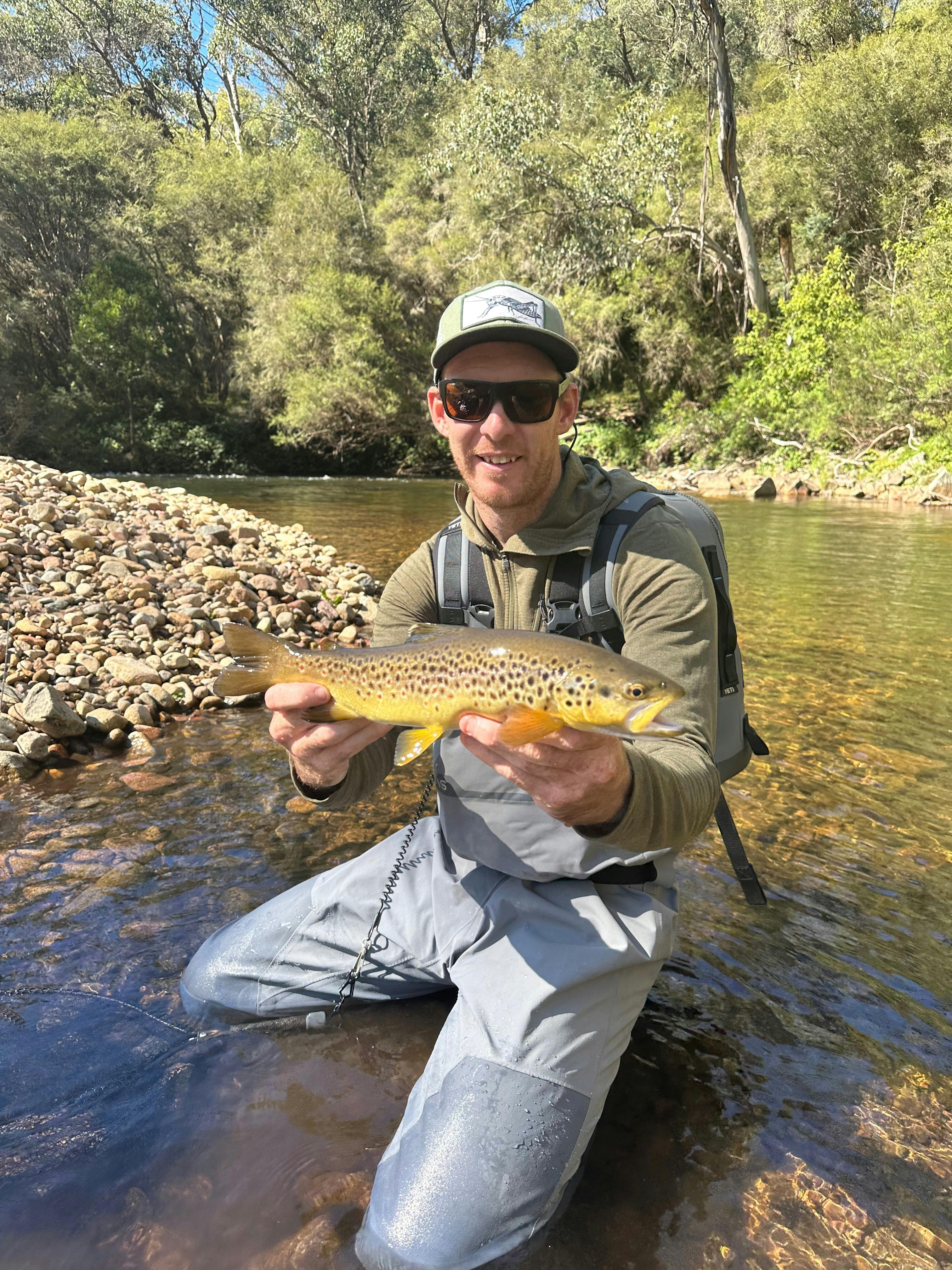 Mansfield Fly Fishing Guide Trent Storer with a High Country Brown Trout