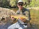 Mansfield Fly Fishing Guide Trent Storer with a High Country Brown Trout