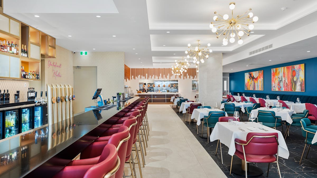 Amore Ristorante serves Italian cuisine in an elegant setting with a cozy and vibrant ambiance.