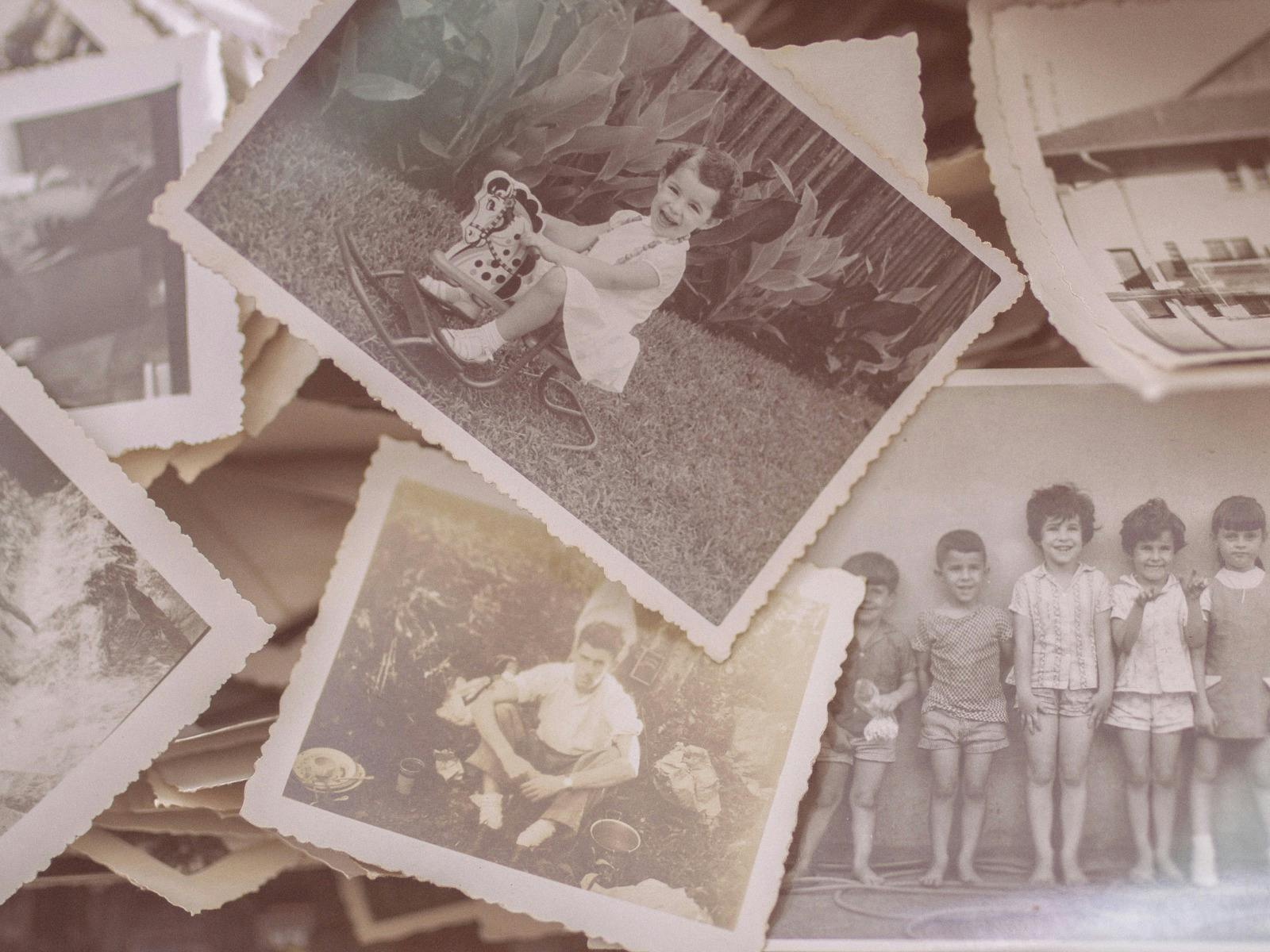 A collection of black & white photos of children from the 1950s.