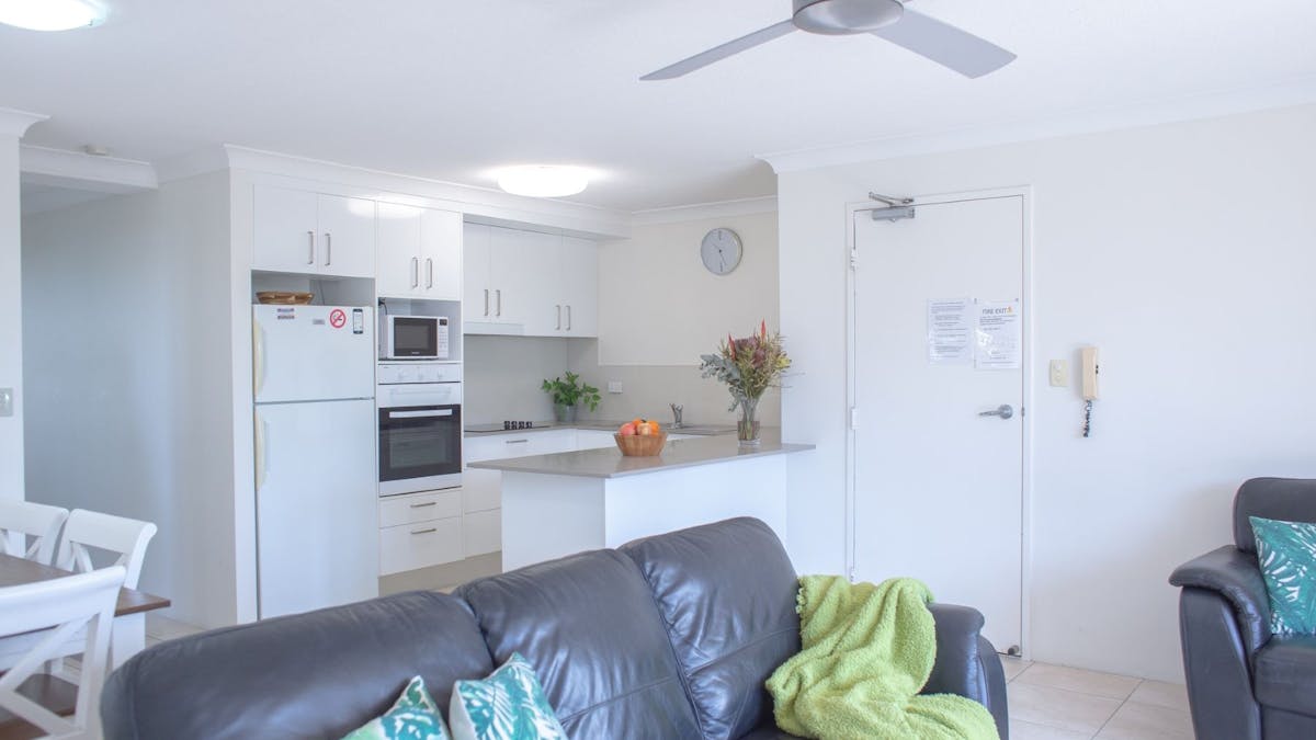 Kitchen, dining, living area.
