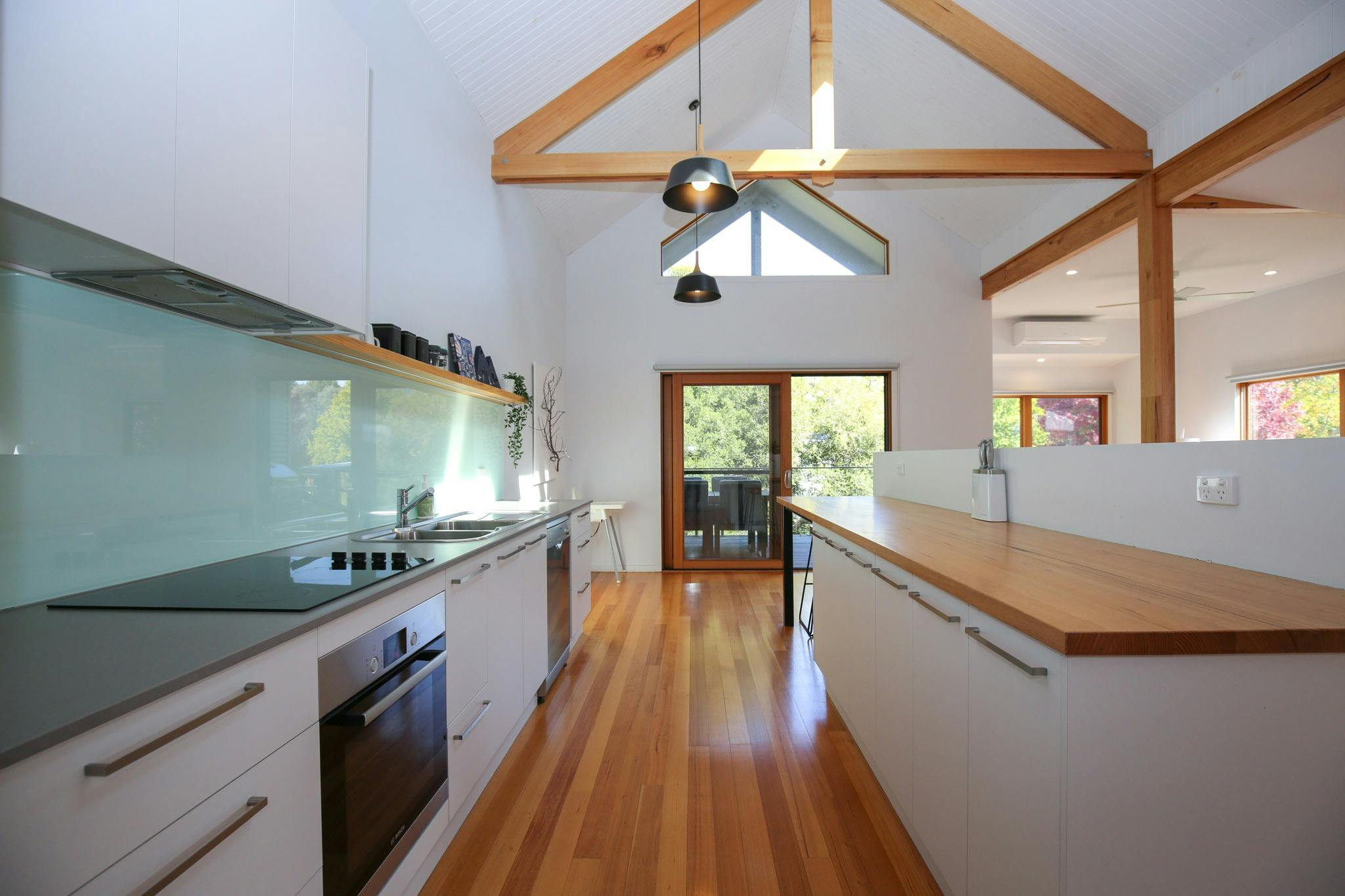 Kitchen to balcony at The Stelvio Villas One Bright Accommodation Alpine Valley Getaways