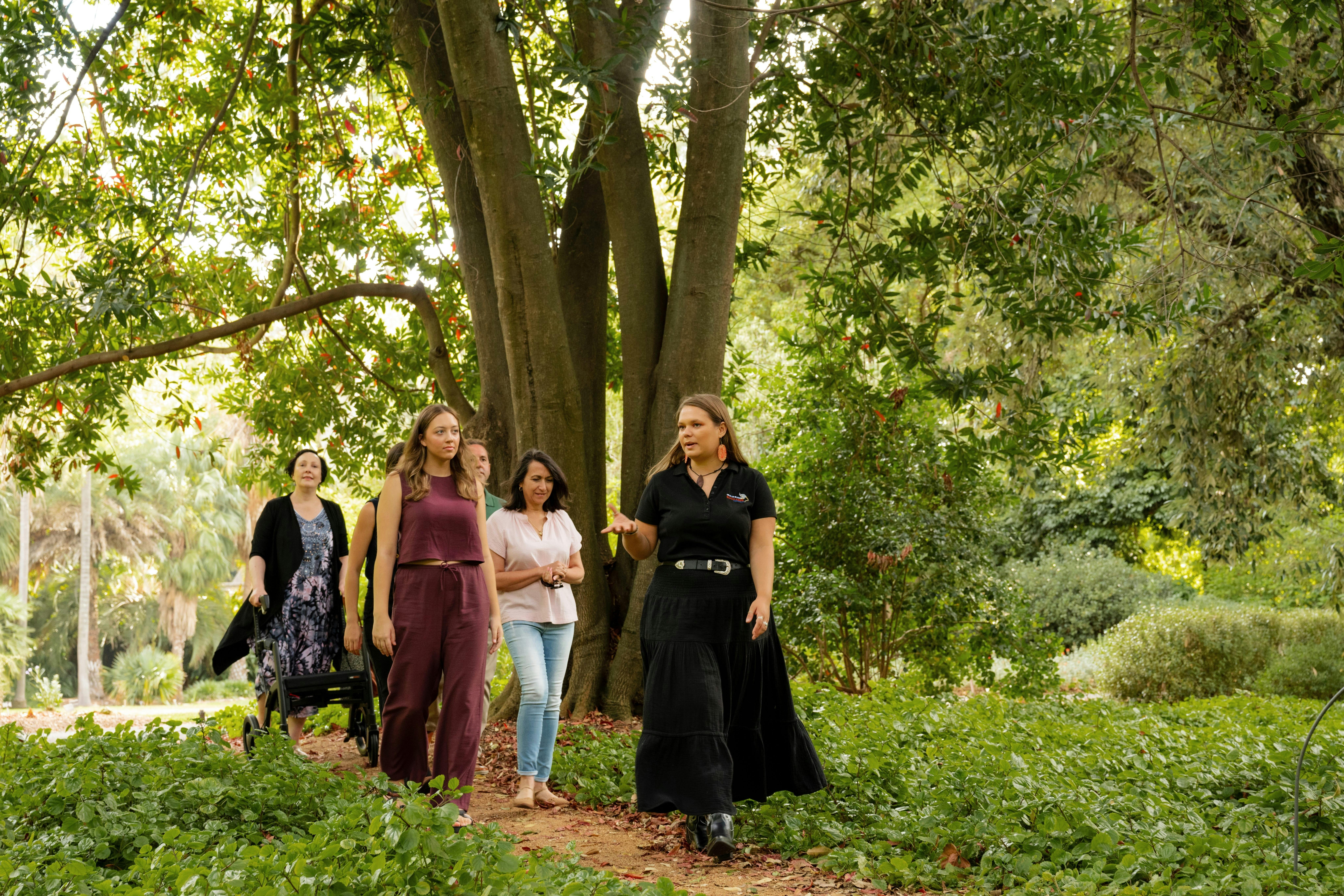 Iteka taking a group around the Adelaide Botanic Gardens