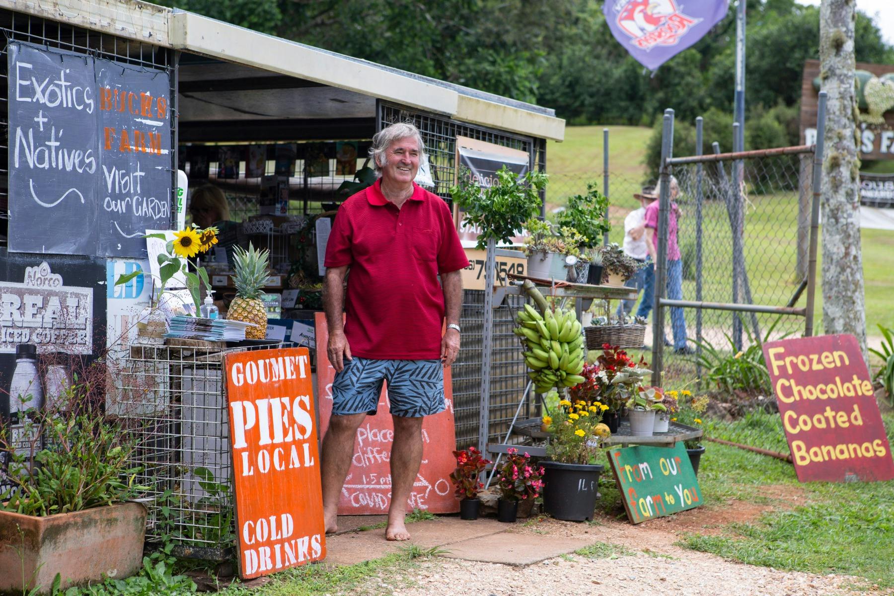 Owner outside of Buck's Farm produce stall