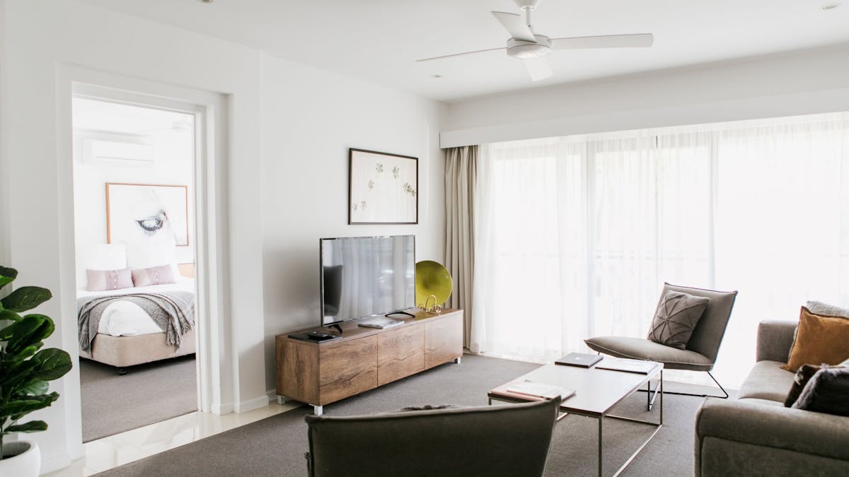lounge overlooking balcony and gardens