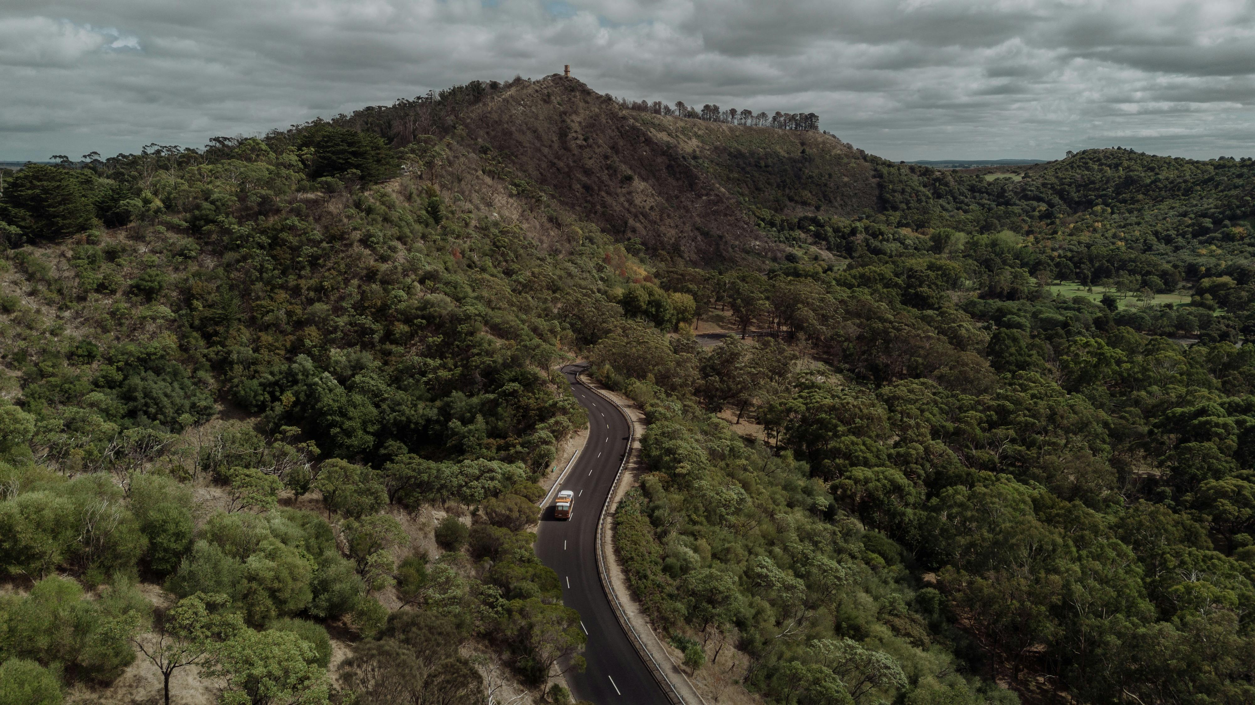 car driving into the volcanic crater