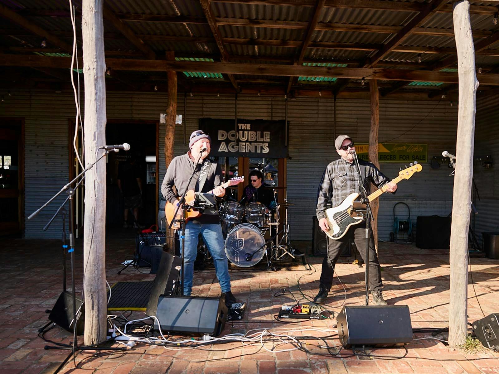 The Double Agents Band playing outside at Barneys