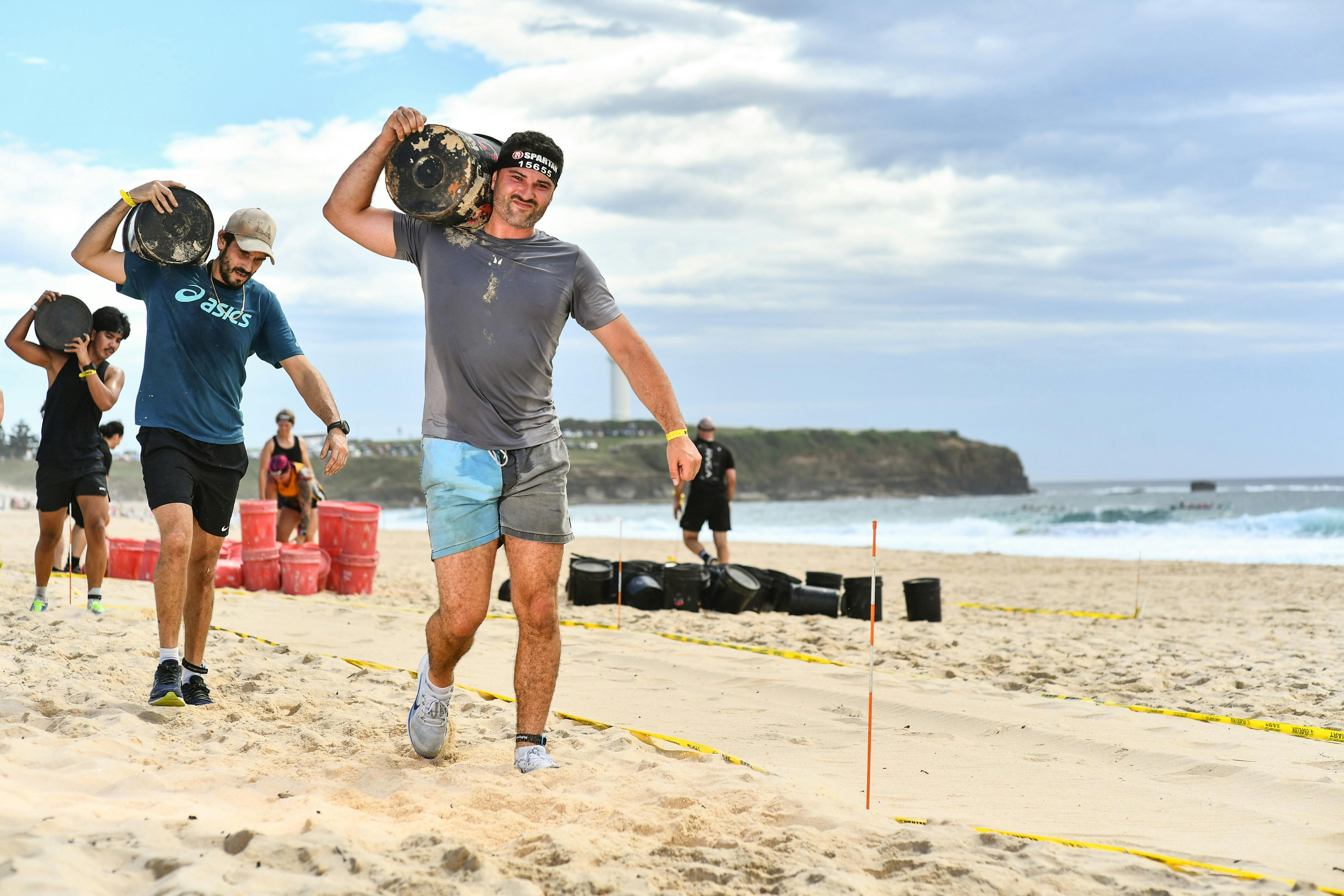 Carrying bucket on sand