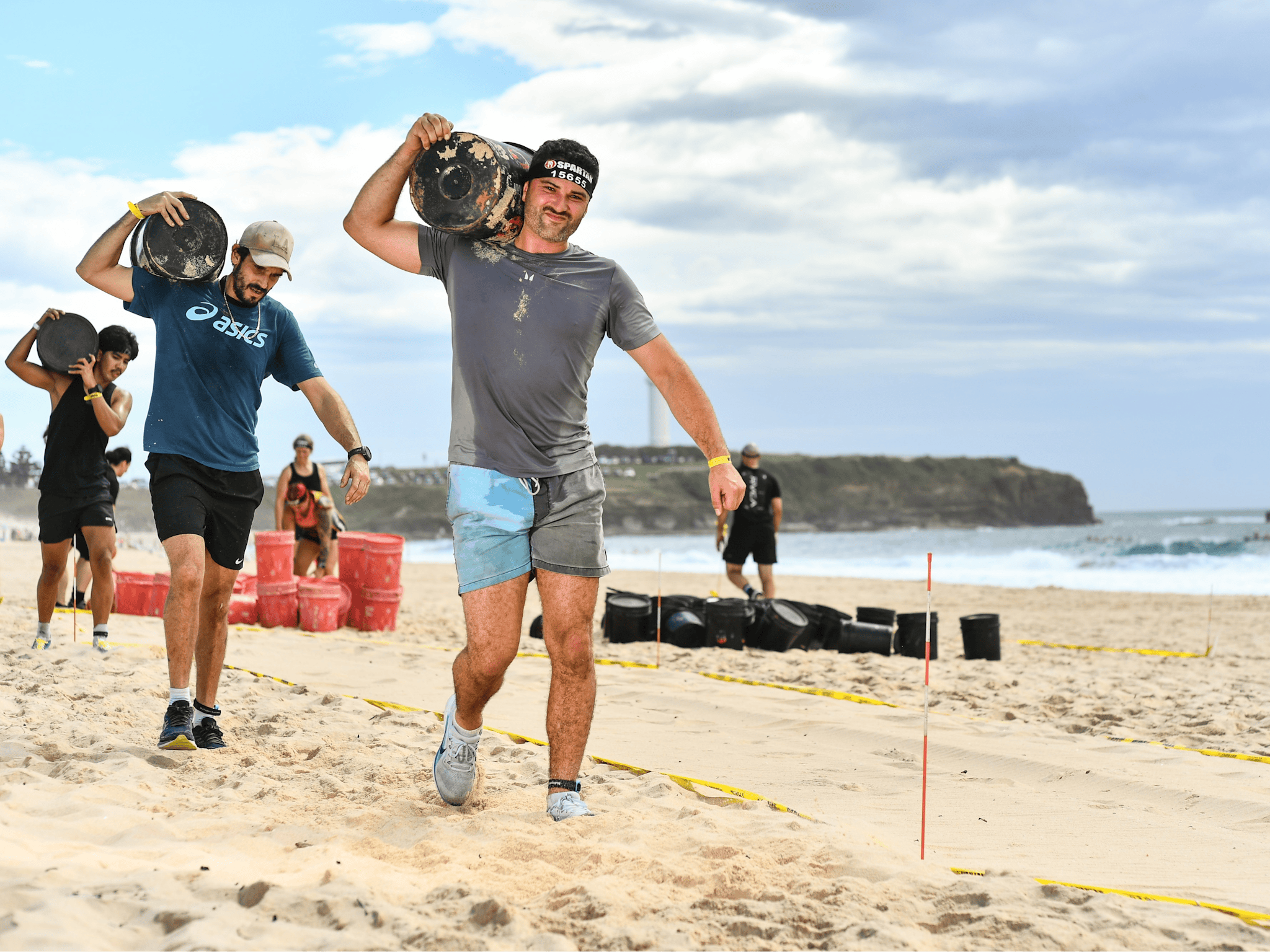 Carrying bucket on sand