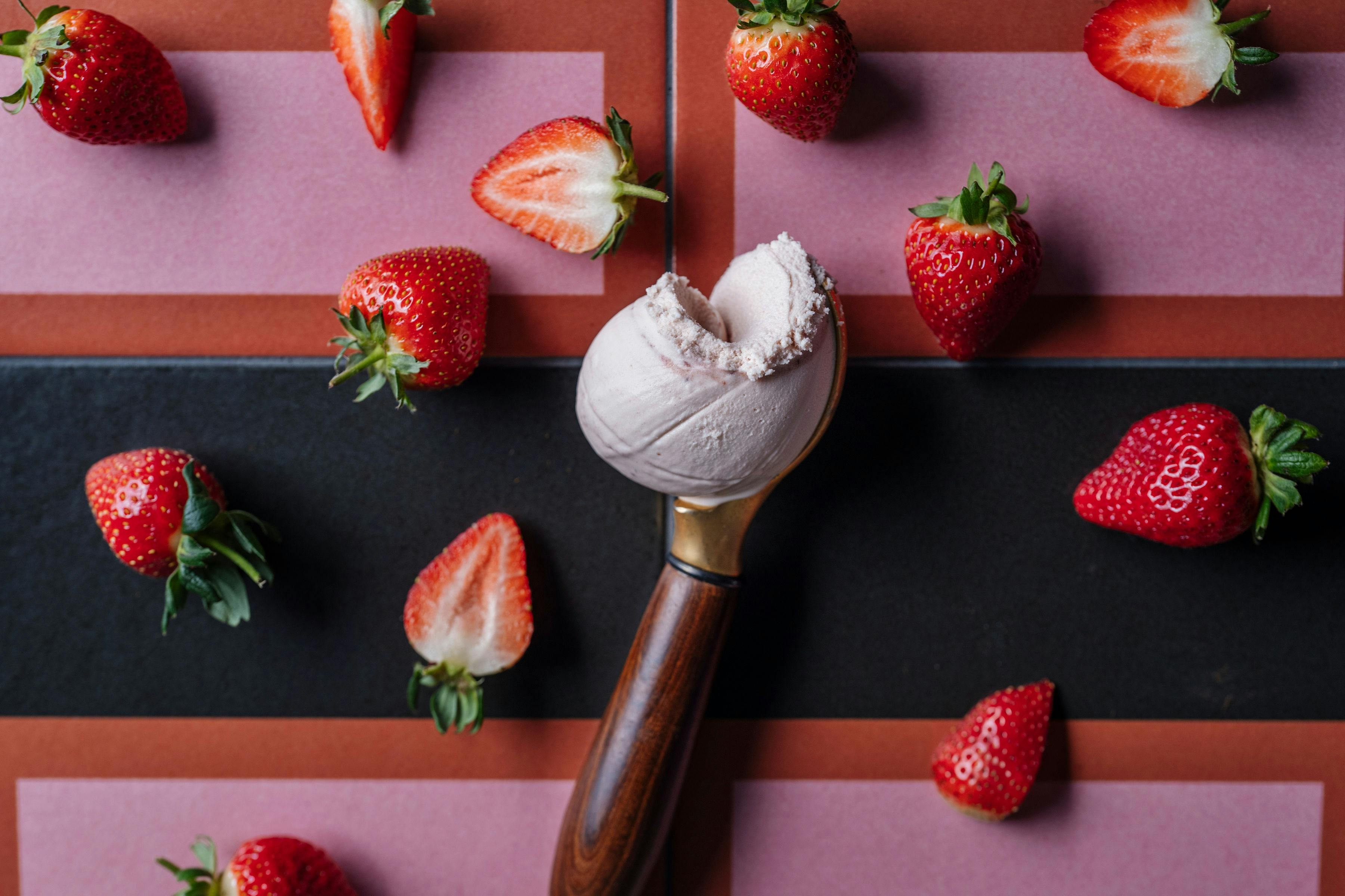 Strawberry ice cream with a swirl of our strawberry jam
