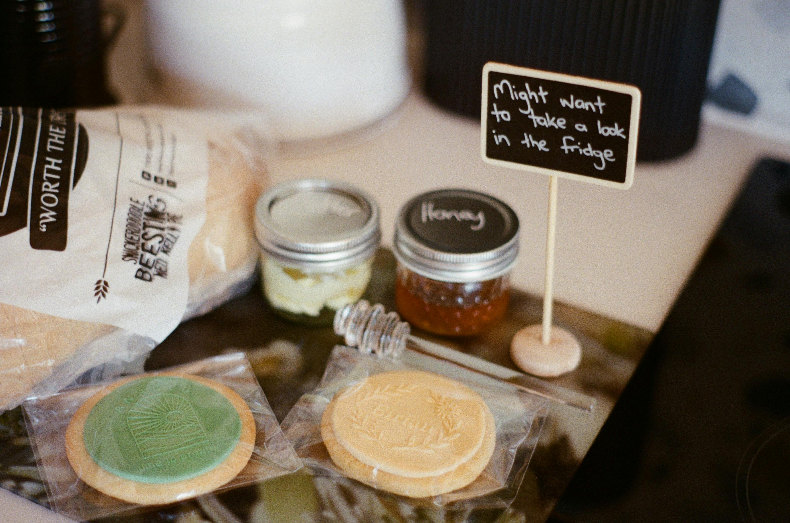 Welcome treats and small details arranged on an interior surface.