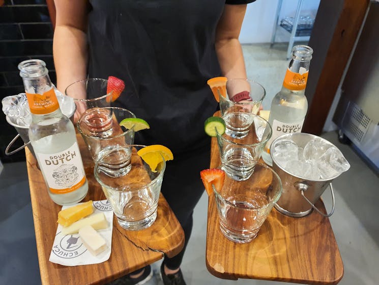 Tasting Flight including three selected spirits tonic or mixer and garnishes