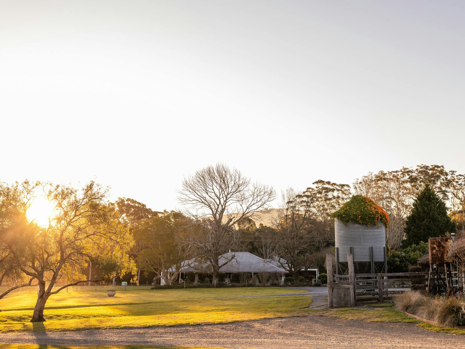 Sunset over the farmhouse and silo