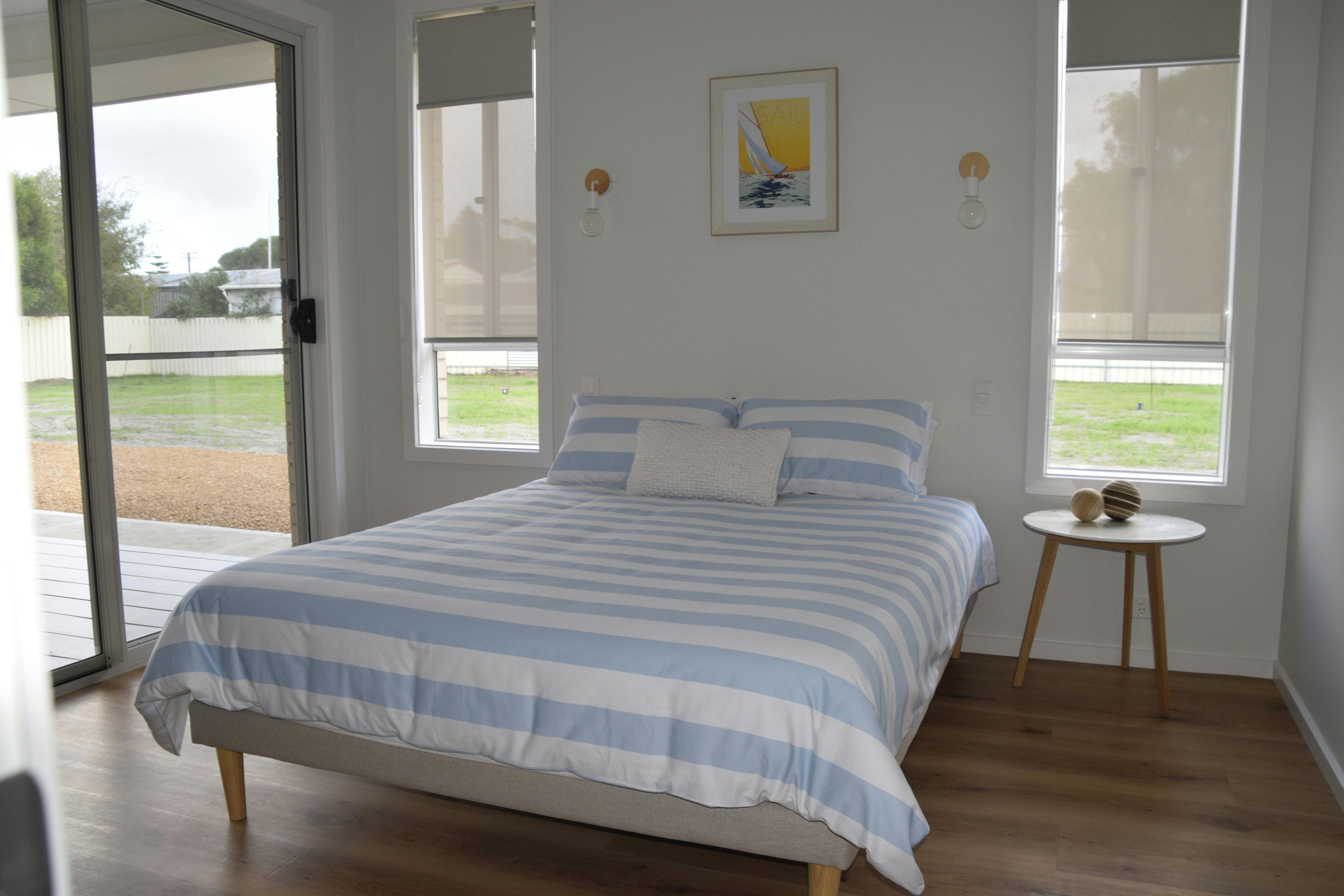 Access bedroom with ramps to out side area, larger door ways, lever handles and enlarged switches