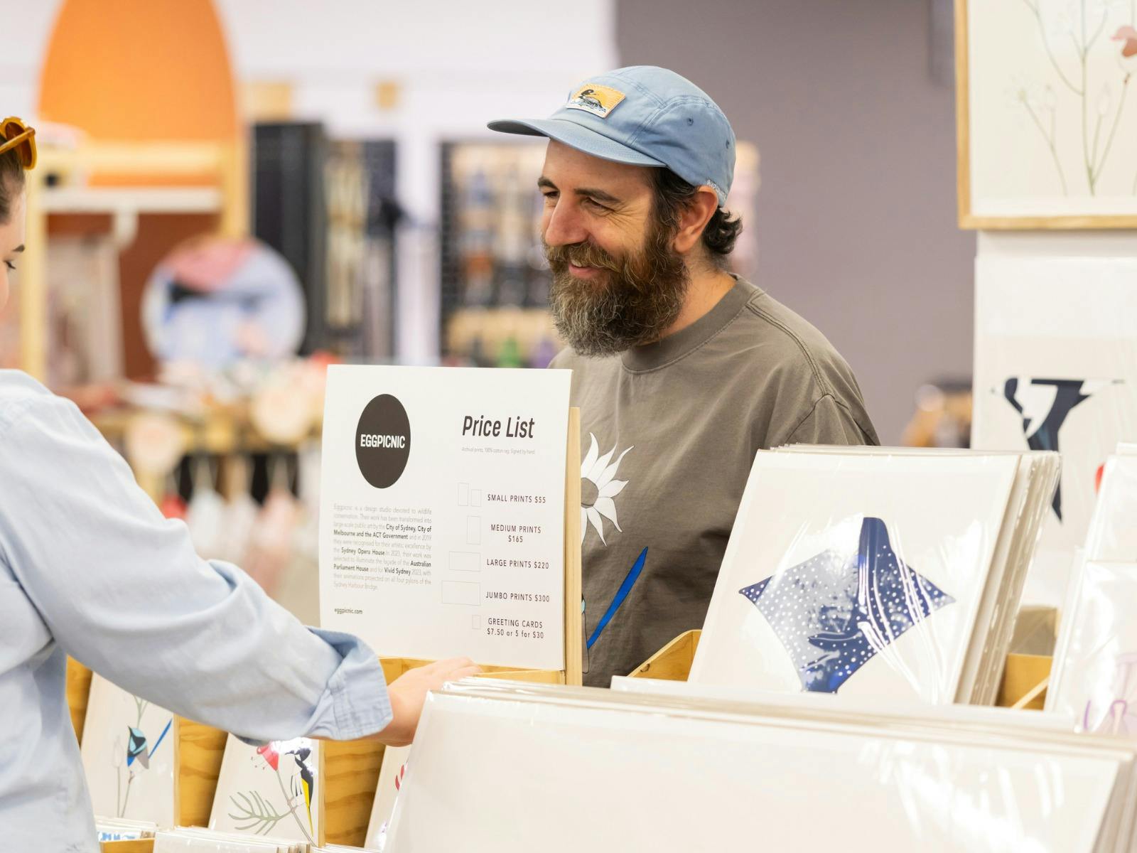 Eggpicnic talking to a customer