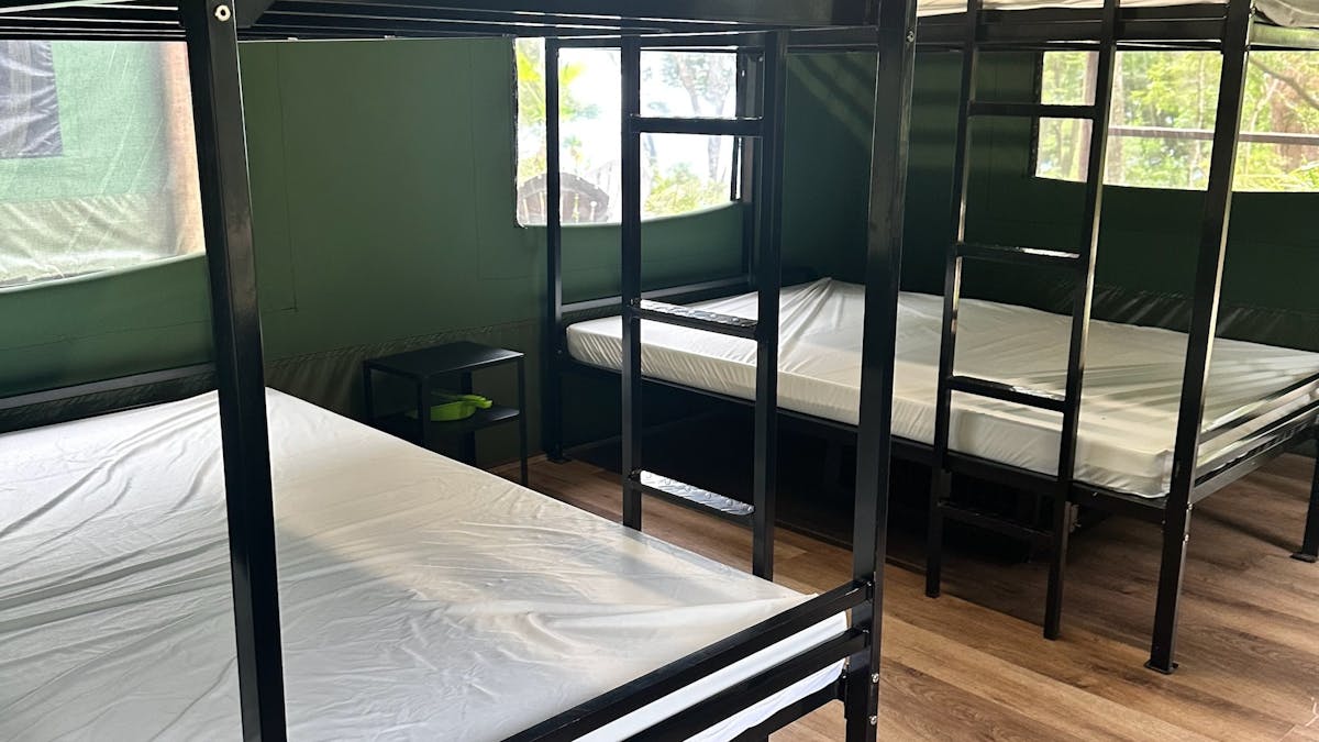 Image shows the interior of the Safari Tents with bunk beds Image shows the interior of the Safari Tents with bunk beds