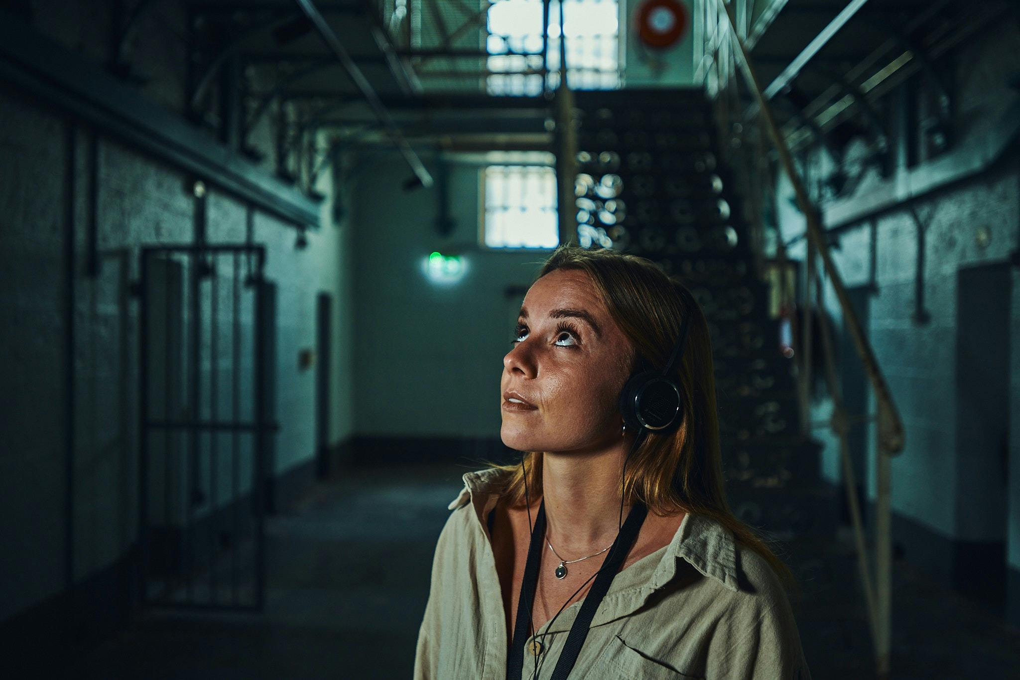 girl with headphones on Pentridge Prison Tour