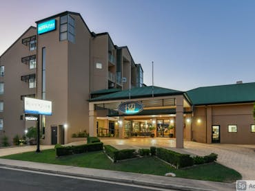 The hotel is in a 5 story building aw well as the smaller restaurant building.  We are easily seen.