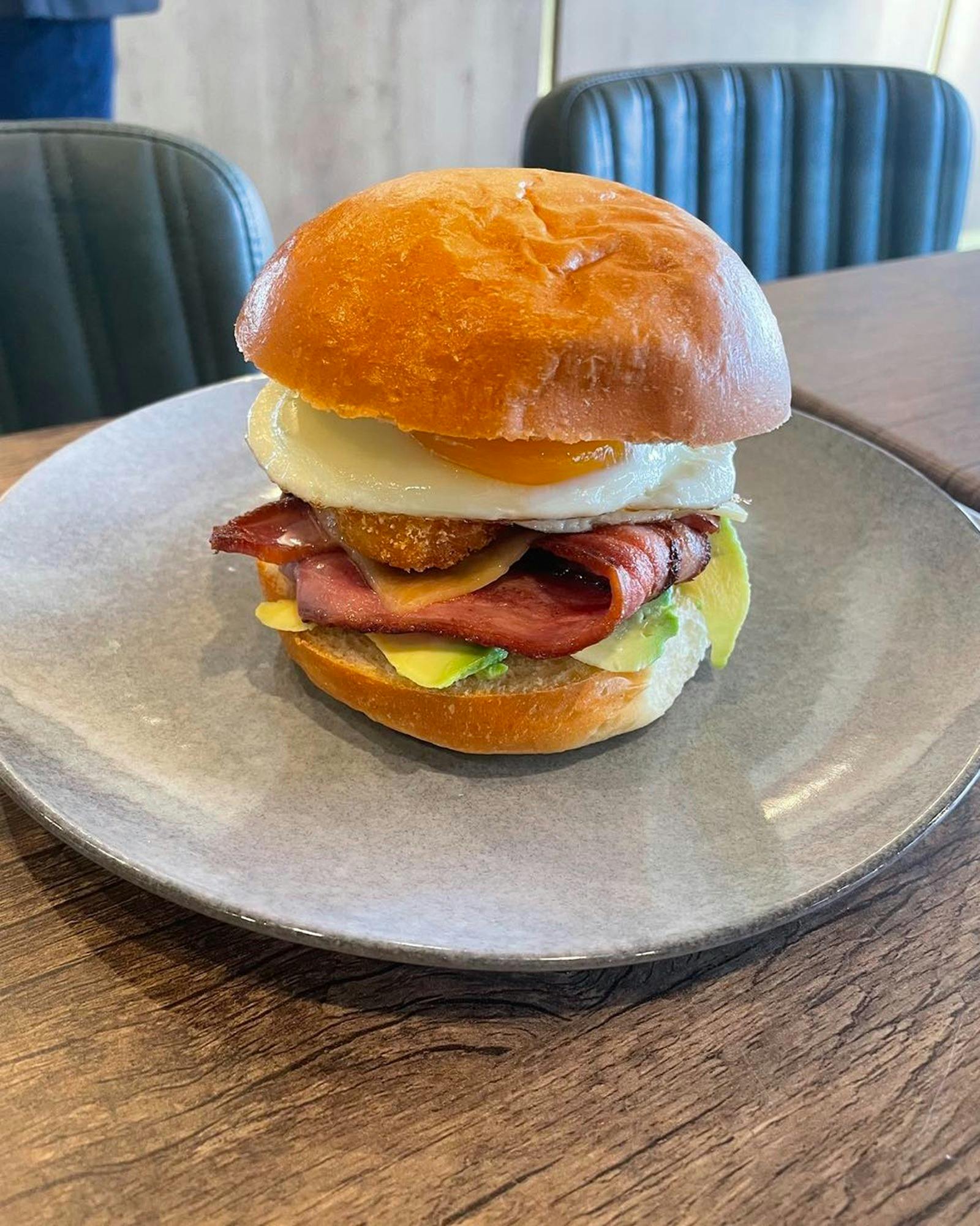 Breakfast Burger with bacon and egg on a plate