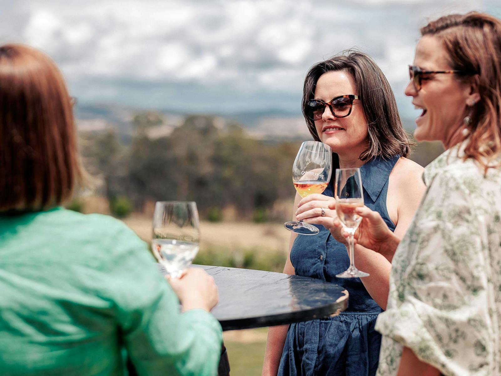 Share a drink with friends on the deck at Gapsted Wines
