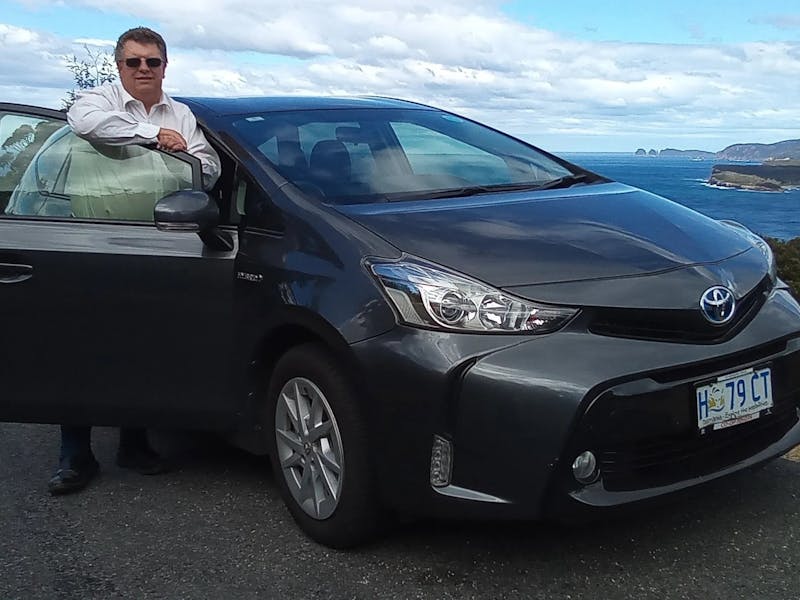 Philip with the car at a lookout on the Tasman Peninsula