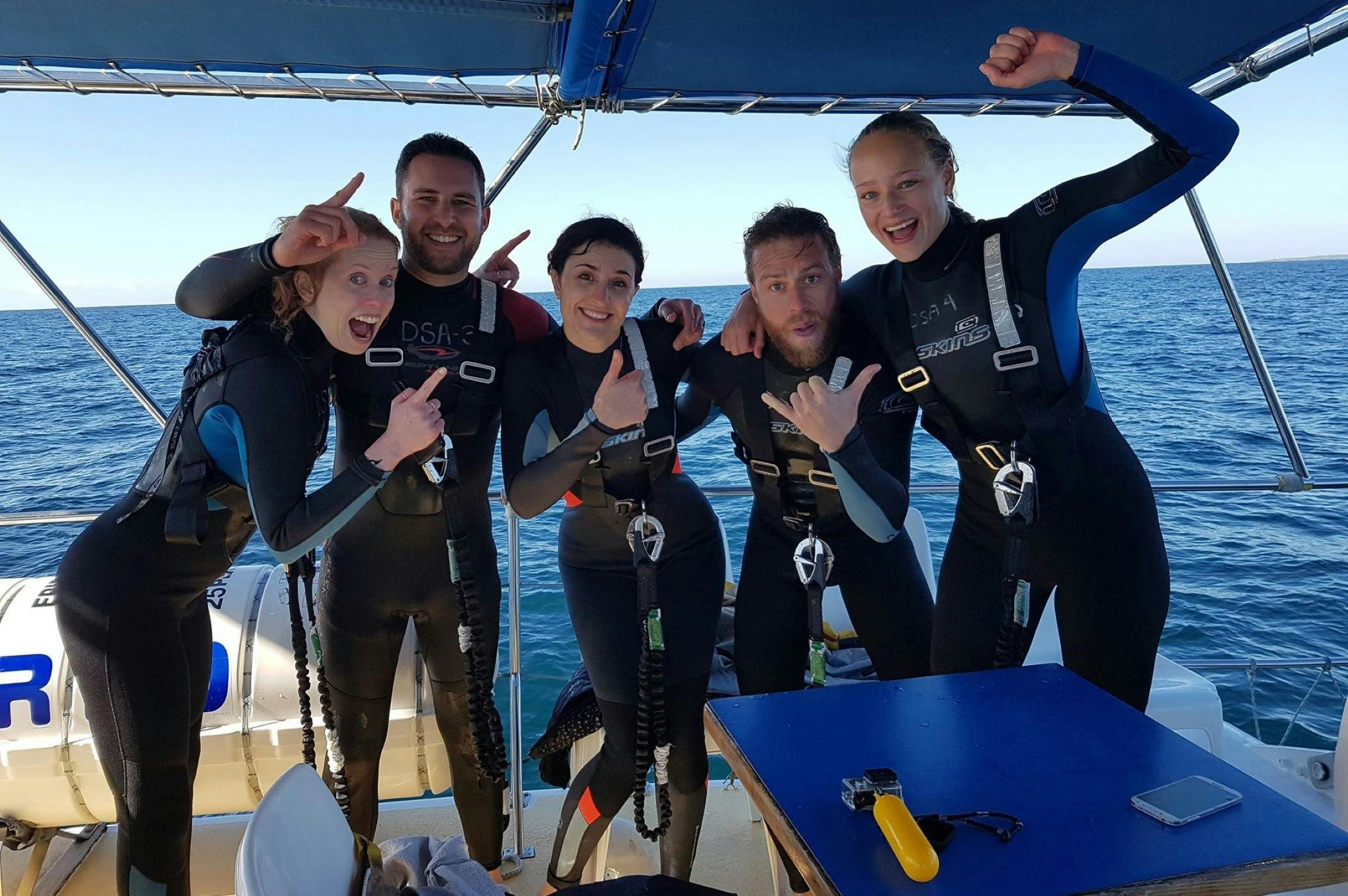 Group of very happy guests after their swim.