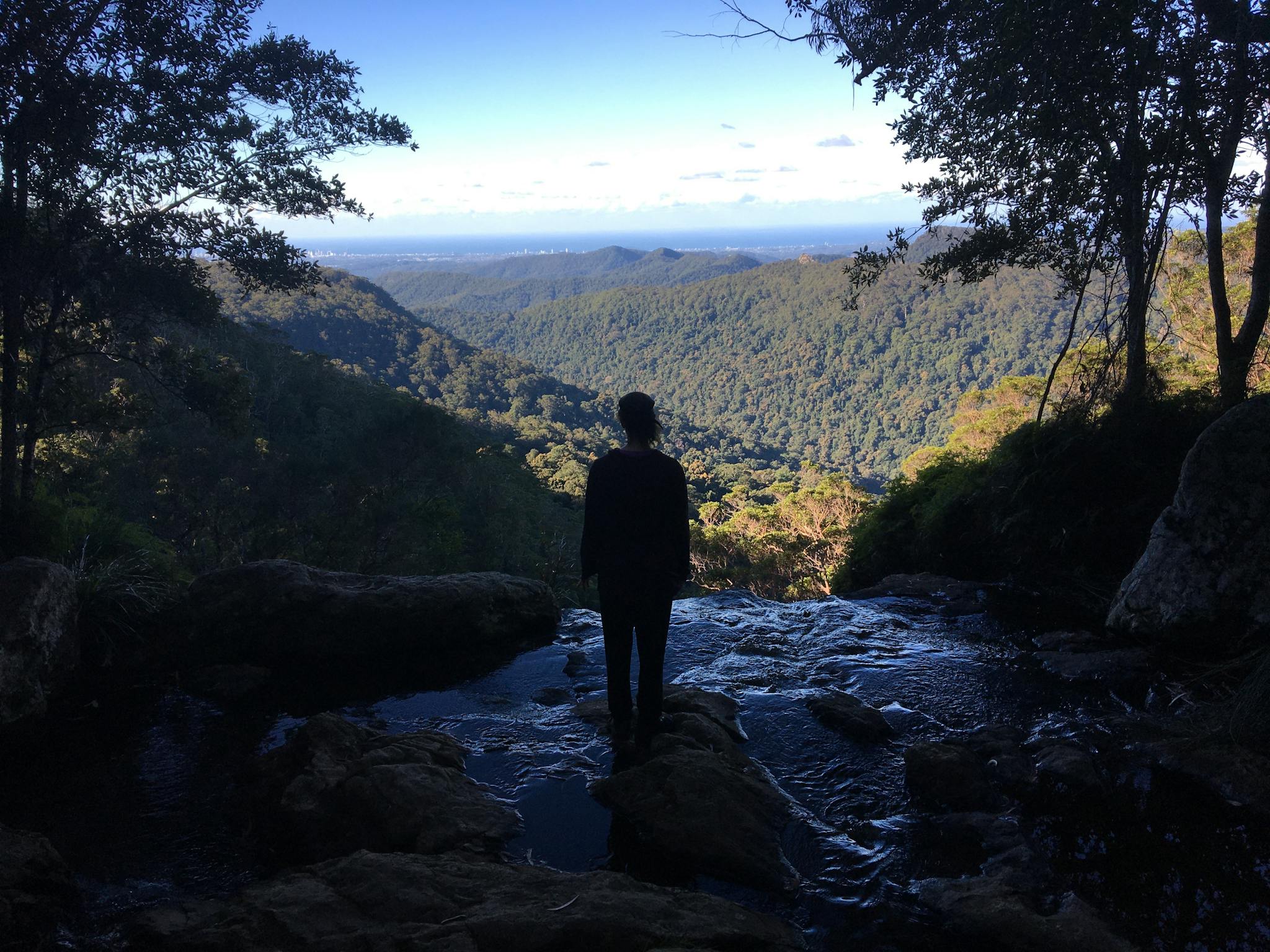 Someone admiring a mountain view Someone admiring a mountain view