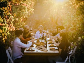The Zema Family enjoying a meal in the vineyard at Zema Estate