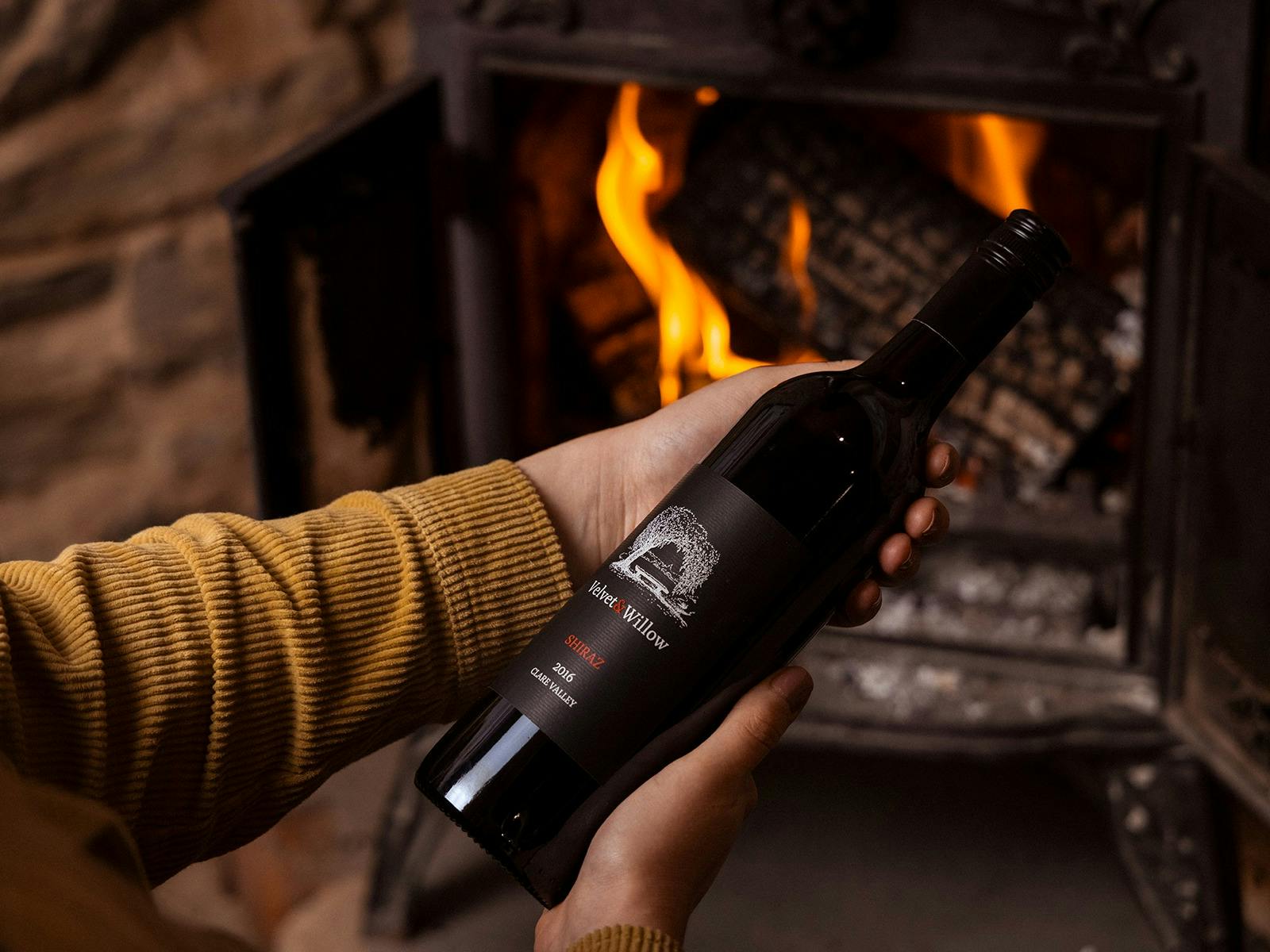 Nothing better than a bottle of red wine by the fire.