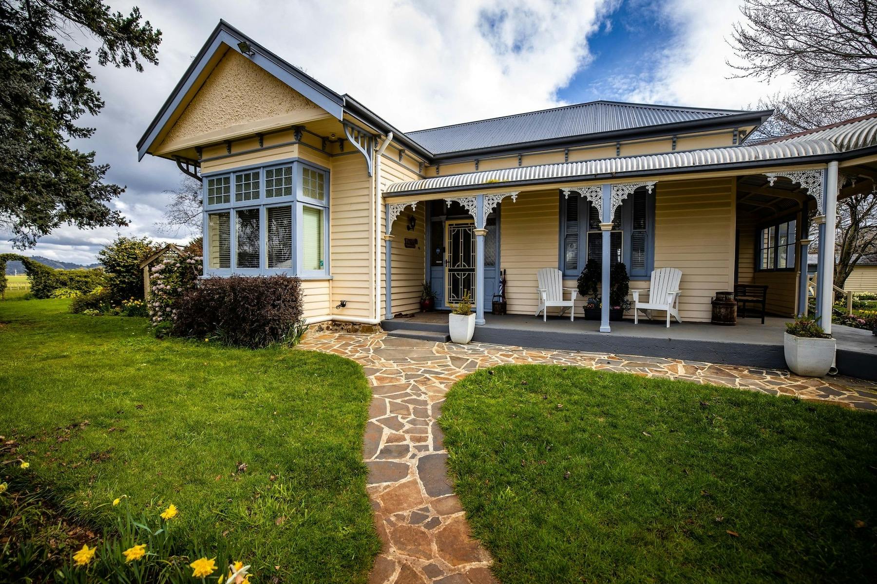 Glencoe Country Bed and Breakfast exterior with veranda and garden path