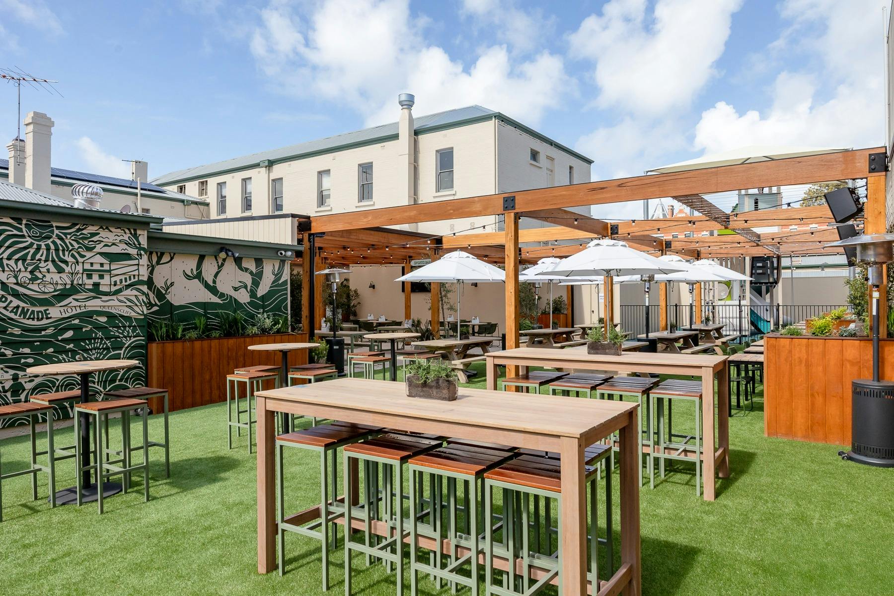 beer garden, high tables, low benches.