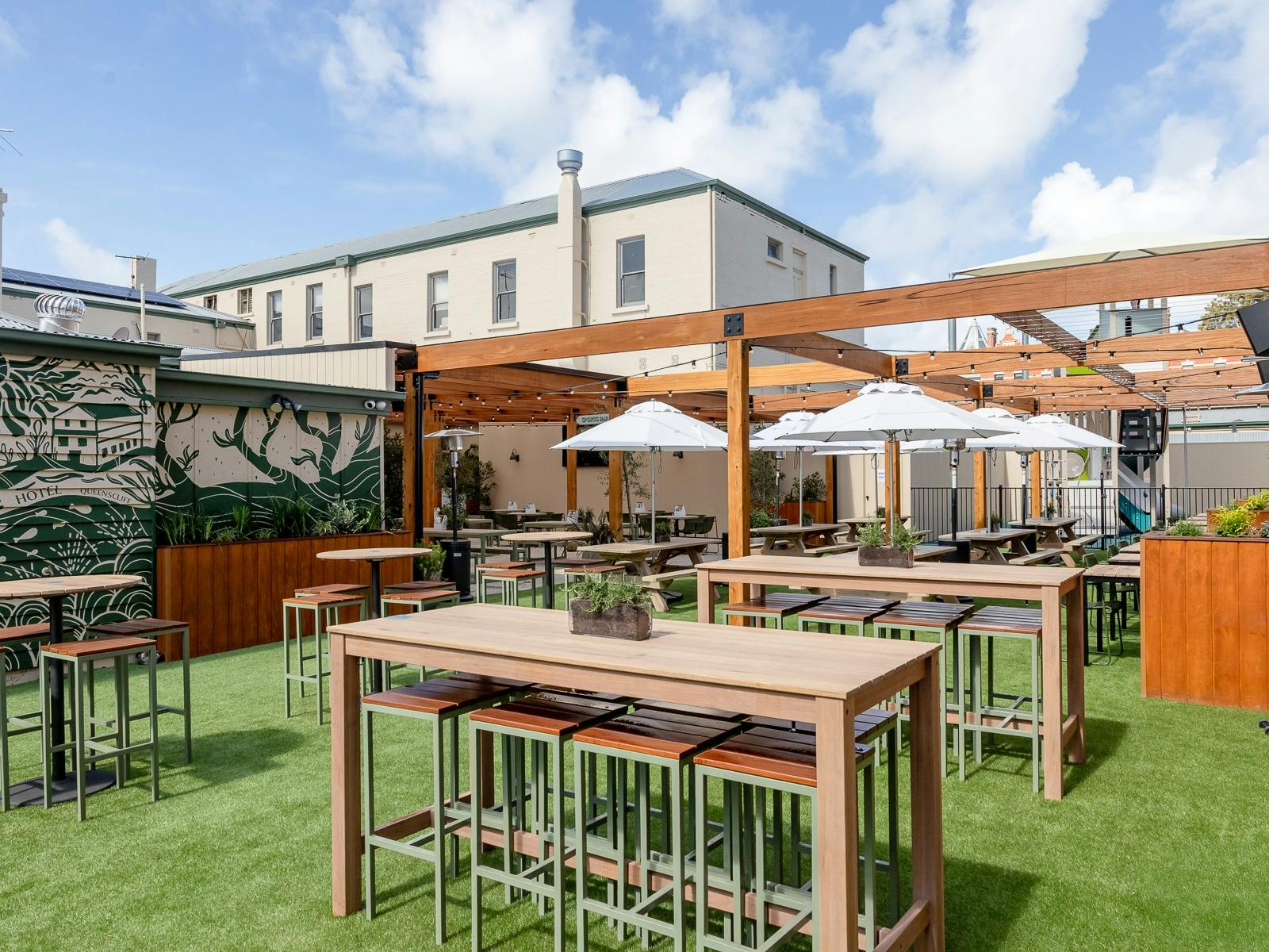 beer garden, high tables, low benches.