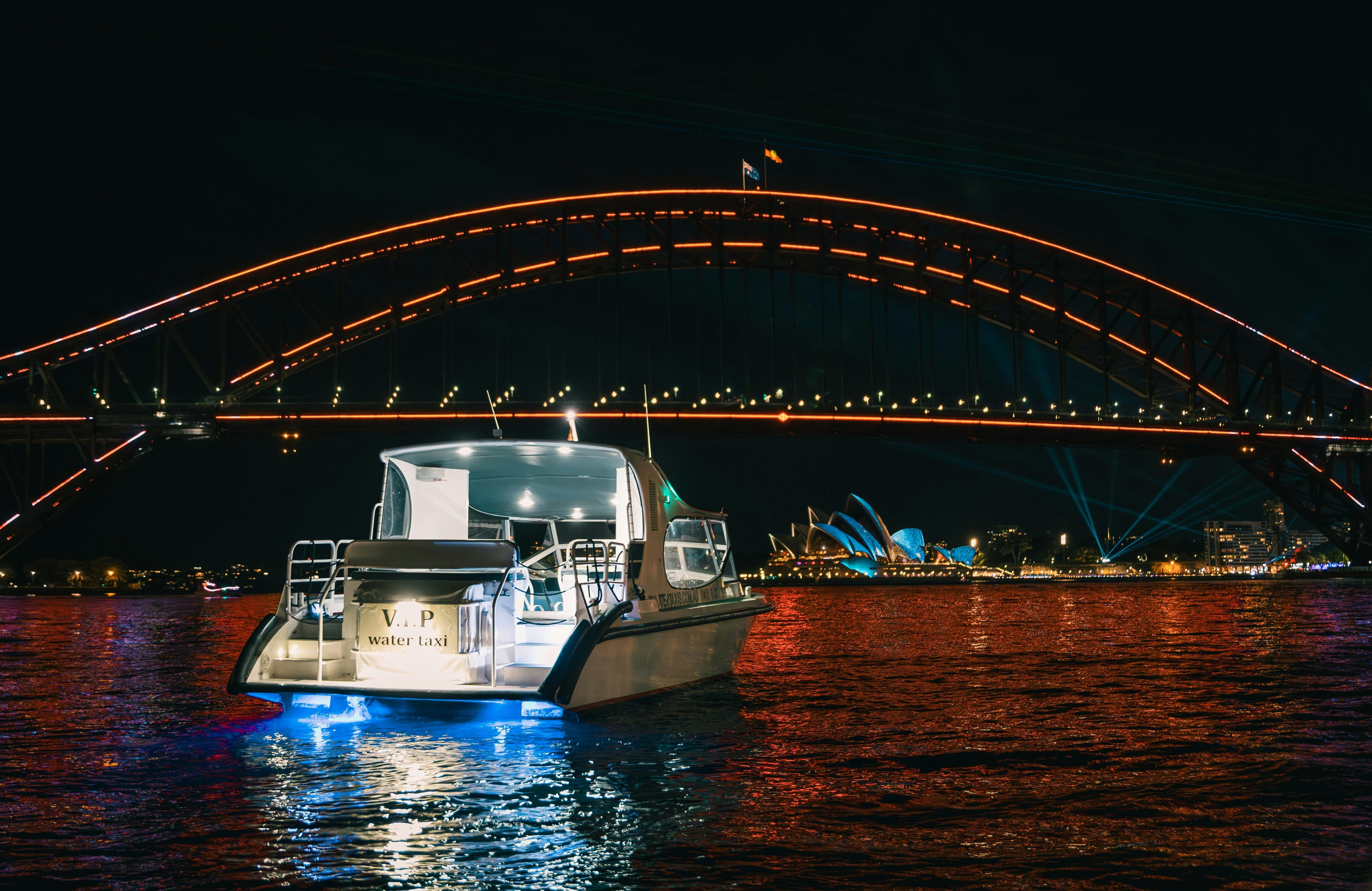 Water taxi on Sydney Harbour with the Sydney Harbour Bridge in front