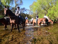 Crossing the river on the overnight horse ride