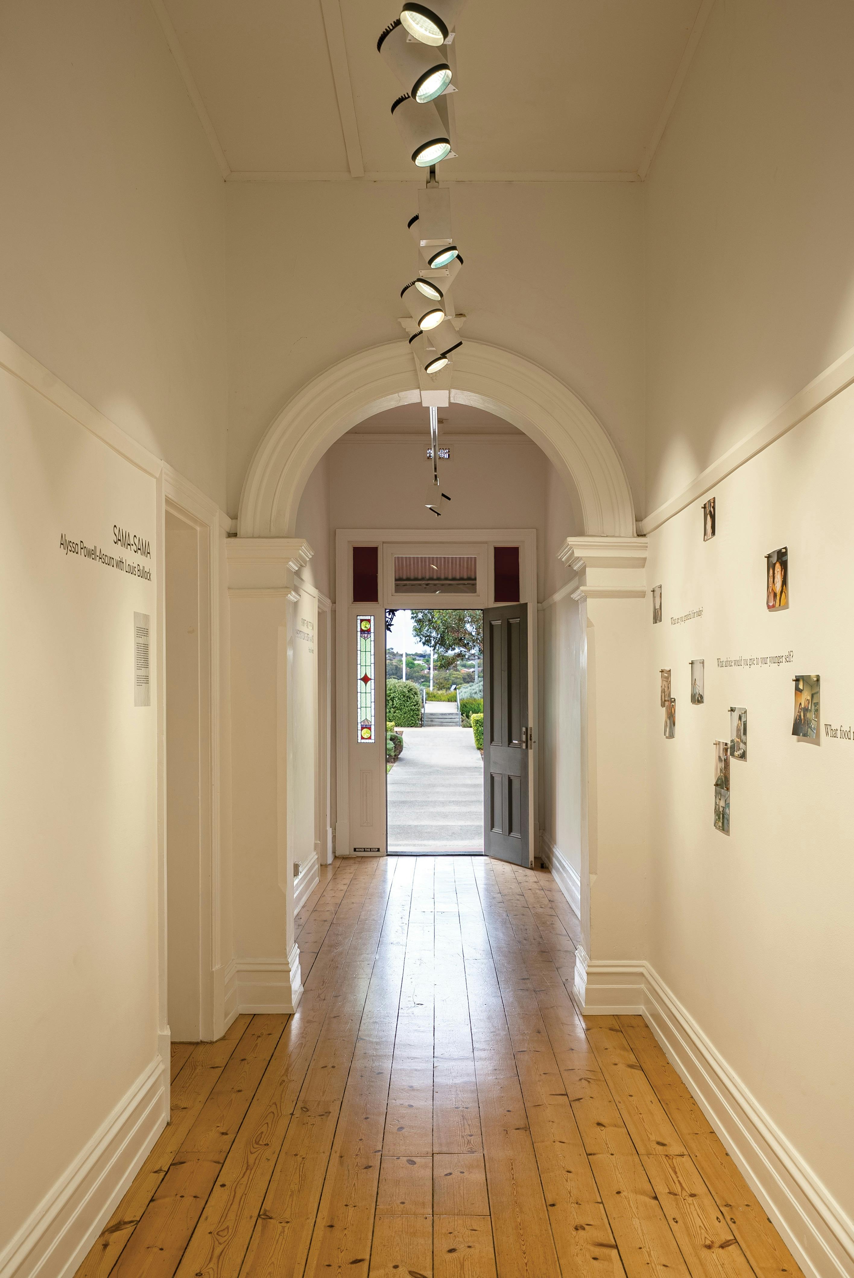 Hallway Gallery featuring works by Alyssa Powell-Ascura and Louis Bullock