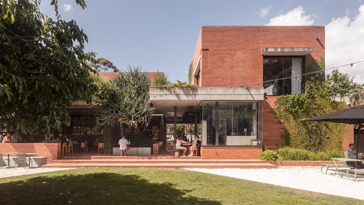 Exterior view of Cornerstone Stores in Tugun showing the red brick facade of the Richards and Spence