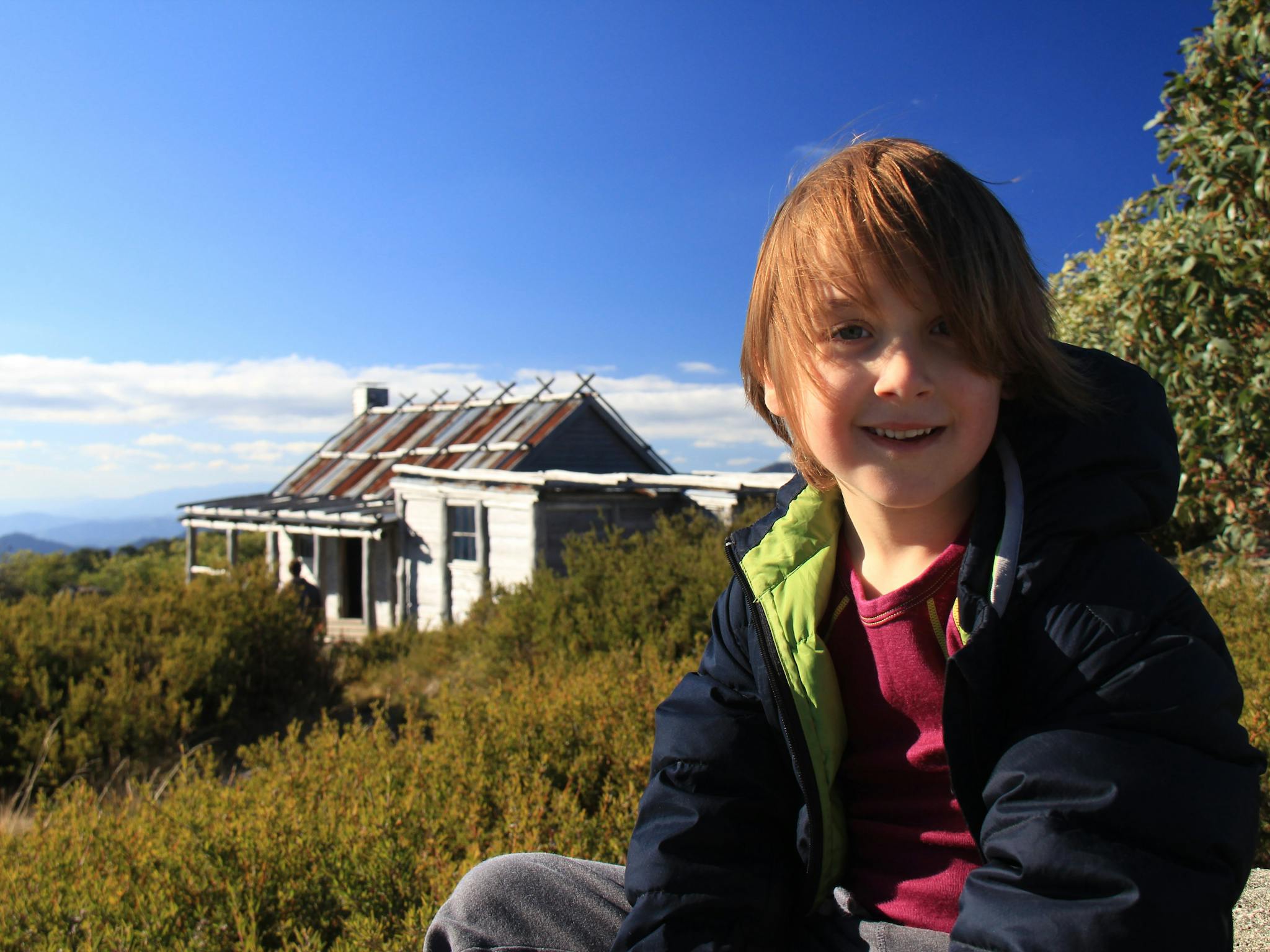 A very happy child at Craig's Hut.