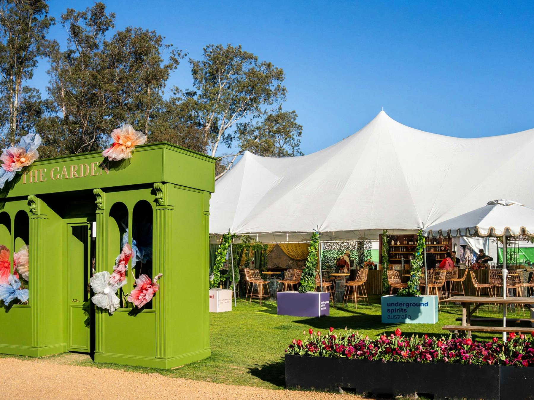 Underground Spirits Gin Garden at Floriade in Canberra, with outdoor bar, seating and spring flowers