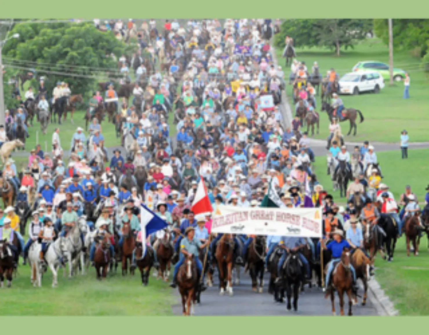 3 trail rides join together to form the main street parade in the main street of Kilkivan