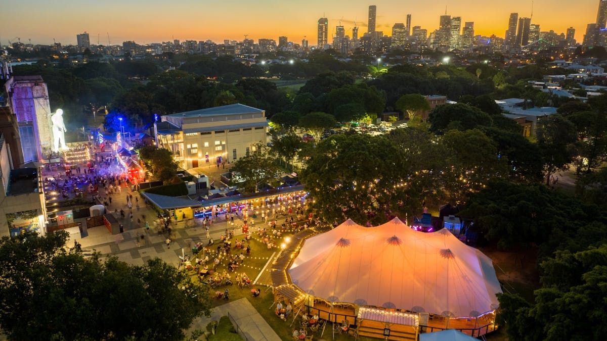 An aerial view of Brisbane Powerhouse at dusk.