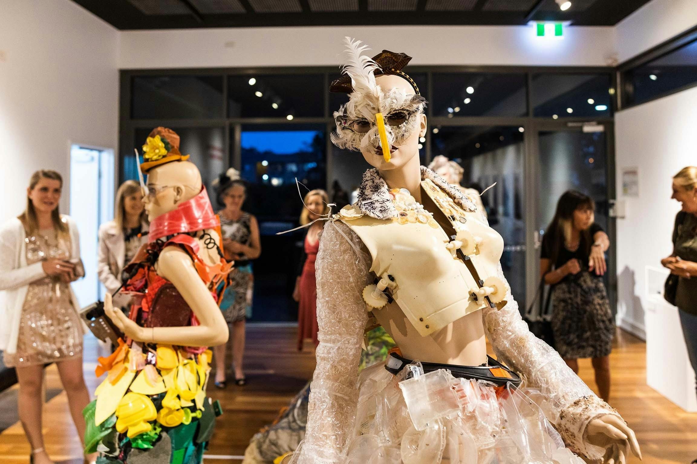 A group of women observing an art exhbition at Bribie Island Seaside Museum