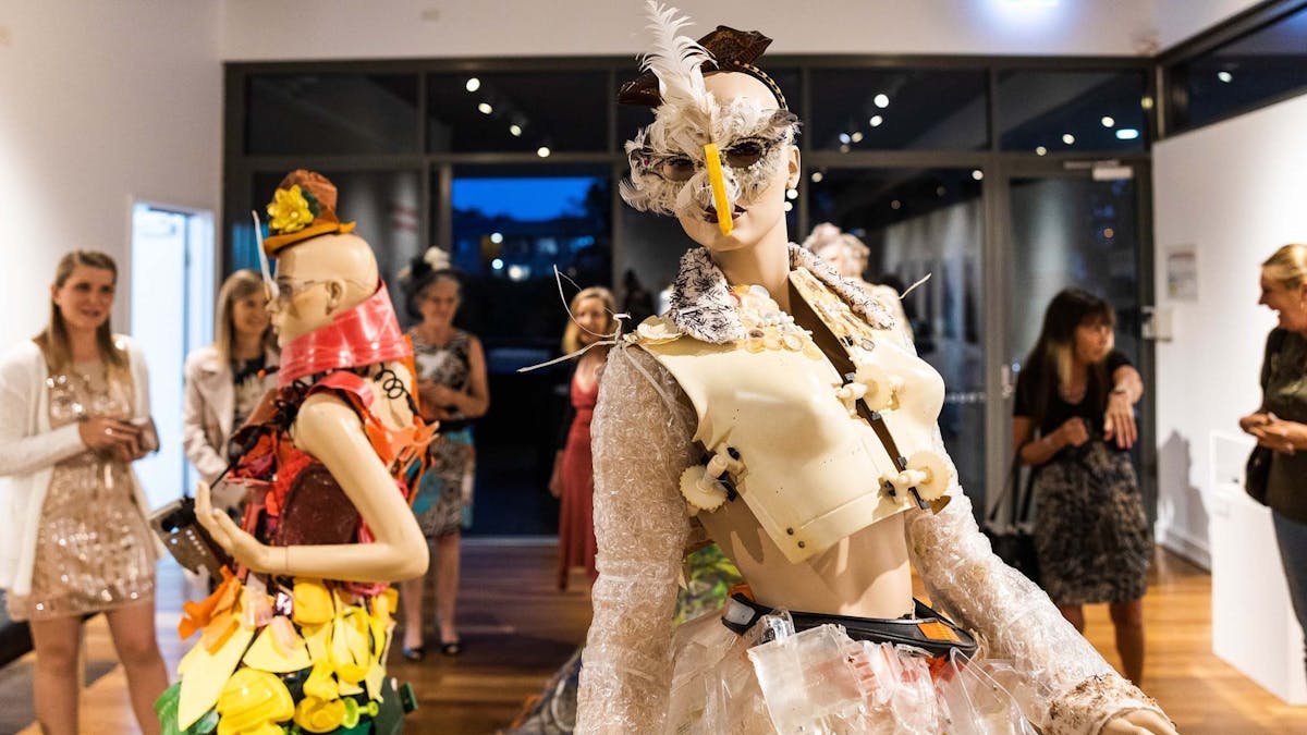 A group of women observing an art exhbition at Bribie Island Seaside Museum